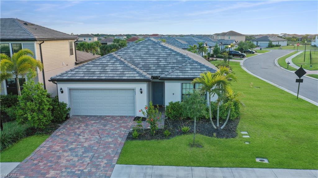 This home is a short sale. Welcome to this modern single-story residence located in the highly desirable Hampton Lakes at River Hall community. Built with a
contemporary Florida design, this home offers an open-concept layout featuring spacious living areas, abundant natural light, and seamless
indoor-outdoor flow ideal for entertaining and everyday living. The kitchen is designed for both function and style, showcasing modern
cabinetry, a large island with seating, and ample counter space that opens directly to the main living and dining areas. The primary suite is
privately situated and includes a well-appointed bath and generous closet space, while additional bedrooms provide flexibility for guests,
office space, or family use. Enjoy Florida living with a covered outdoor lanai and backyard space that can accommodate future pool
installation or outdoor enhancements. The home is located within a gated, resort-style community offering amenities including a clubhouse,
fitness center, resort-style pool, pickleball and tennis courts, bocce, walking and biking paths, and a public golf course nearby. Conveniently
located in Alva, residents enjoy a peaceful setting while remaining within easy access to Fort Myers, shopping, dining, and major roadways.
This home combines modern construction, resort amenities, and low-maintenance living in one of Southwest Florida’s most active lifestyle
communities.