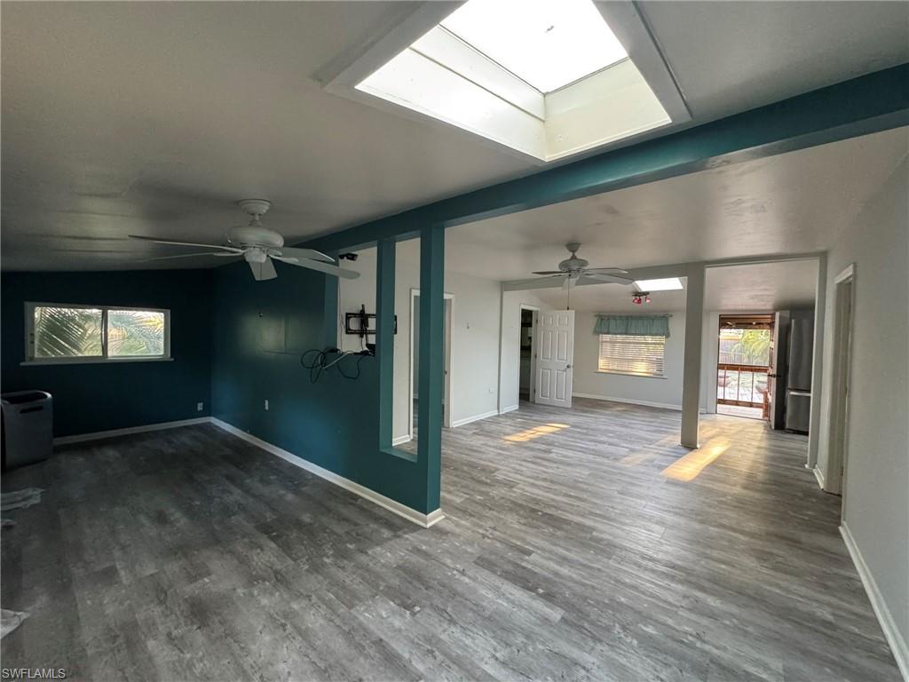 Discover the ultimate blend of space, privacy, and potential in this inviting Bonita Springs pool home, set on a rare double lot surrounded by lush tropical landscaping. Inside, an open layout offers seamless flow between the living, dining, and kitchen areas, creating a comfortable setting for everyday living and effortless entertaining. Walls of windows draw in natural light and highlight the home’s connection to the outdoors, where a sparkling pool and generous patio provide a tranquil place to relax or host friends. The oversized lot allows plenty of room for gardening, pets, or future expansion—giving you the freedom to make the space truly your own. Best of all, there are no HOA fees, allowing you to enjoy your property without limits. Whether you’re envisioning a stylish renovation or appreciating the home as it is, this property offers a unique opportunity in one of Bonita’s most desirable areas. Located just minutes from the vibrant energy of downtown Bonita Springs, you’ll find local favorites like the Sugar Shack, Rooftop at Riverside, and Riverside Park hosting live music, markets, and festivals throughout the year. You’re also close to miles of sandy beaches, championship golf, waterfront dining, boutique shopping, and major roadways for easy access to Naples, Fort Myers, and RSW Airport. Perfect as a full-time residence or seasonal getaway, this home captures the relaxed charm and freedom of true Southwest Florida living.