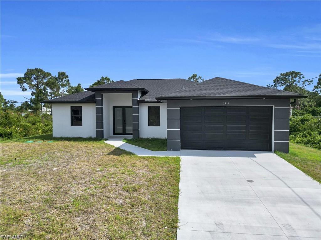 Discover the Alessandra model in Lehigh Acres, featuring 3 bedrooms plus a versatile den and 2 bathrooms. The open-concept design connects the kitchen, dining, and living areas, while the split-bedroom layout provides added privacy. Porcelain tile flooring runs throughout the home, complemented by impact-resistant windows and doors. The modern Italian-style kitchen features quartz countertops, stainless steel appliances, and a waterfall island ideal for casual dining and entertaining. Quartz countertops continue in the bathrooms for a cohesive finish. The den offers flexible space for a home office, study, or hobby room. Schedule your private showing today!