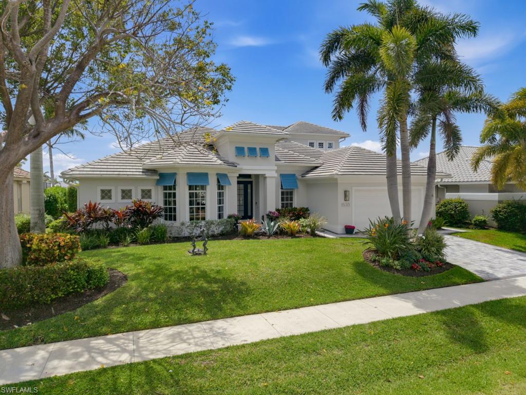Ready to move into, this beautifully renovated waterfront residence offers 4 bedrooms plus a dedicated office, 3 baths, & 2,825 sq. ft. under air. Built in 2004, this sunny home with southern exposure underwent an extensive owner renovation in 2024–2025, thoughtfully completed with Coastal Homes. Improvements include a new roof, new tile flooring, fresh interior and exterior paint, new lighting and recessed lighting, updated plumbing, and custom cabinetry and countertops. The redesigned kitchen features all-new cabinetry and appliances, including an ice maker, while additional cabinetry enhances the dinette area. The living room showcases attractive custom woodwork on the ceiling, complemented by shiplap accents. All bathrooms have been renovated, including a beautifully updated primary bath with a private water closet, soaking tub, glassed in shower & luxury toilet. The upstairs bedrooms share a full bath & lovely balcony for relaxing in the sunshine. Enjoy southern exposure, a pool, and a sandy beach-style lounging area along the waterfront. The 77-foot-wide lot features a newer dock (2023) with two boat lifts and a fish-cleaning table. Additional waterfront improvements include a new seawall cap & stone-area reinforcement. A whole-house generator with a buried fuel tank provides added peace of mind. Hurricane protection includes shutters, metal Bahama shutters on the front exterior, & beige electric storm screens on the lanai. Other highlights include a new paver driveway, updated landscaping, a newly tiled upstairs patio, & a two-car garage with epoxy flooring and a mini-split system. Offered furnished, subject to just a few exclusions. A beautifully updated waterfront property, ready for boating enthusiasts!