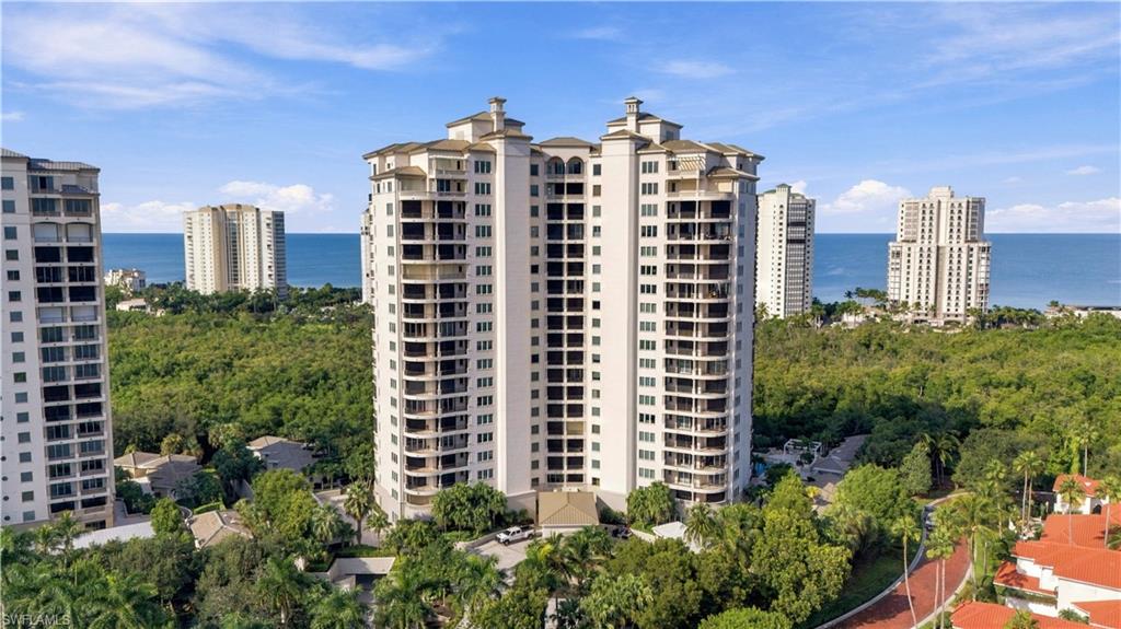 Commanding the 20th floor of Salerno at Bay Colony, this extraordinary penthouse residence offers approximately 5,285 square feet of grand-scale living with sweeping Gulf, bay and mangrove views from one of Naples’ most coveted beachfront communities. With 4 bedrooms, 4.5 baths, a private elevator and two-car garage, the residence combines exceptional space, privacy and an elevated coastal setting.

A gracious gallery-style entry introduces expansive interiors defined by polished stone and marble finishes, impressive ceiling height and walls of glass framing the surrounding water and preserve views. The home is designed for both elegant entertaining and comfortable everyday living, with multiple seating areas, a formal dining room, spacious family room and a grand salon anchored by a fireplace.

The kitchen and breakfast area enjoy abundant natural light and open views, while the oversized primary suite offers a serene retreat with wood flooring, generous proportions and direct access to the surrounding scenery. The primary bath is equally substantial, with dual vanities and separate bathing areas. Three additional guest suites provide excellent privacy and flexibility for family and visitors.

Outdoor living is equally compelling. A large covered lanai provides a front-row seat to the ever-changing colors of the Gulf and western sky, creating an exceptional setting for morning coffee, sunset cocktails or simply enjoying the peaceful coastal panorama.

Salerno offers an intimate luxury high-rise experience with only 69 residences, private elevator access, concierge services, community pool and spa, fitness facilities, guest accommodations, extra storage and secured parking.

Bay Colony residents also enjoy the exceptional lifestyle of Pelican Bay, including access to nearly three miles of white-sand beach, beach attendants, chair and umbrella service, beachfront dining at North and South Beach, scenic walking and biking opportunities, kayaking and canoeing along Clam Bay, and a 25,000+ square-foot Community Center offering fitness, wellness, spa, social and recreational programming. Pelican Bay is also home to one of Southwest Florida’s most active tennis communities, with 18 courts and a full calendar of leagues, instruction and events.

For golf enthusiasts, nearby Club Pelican Bay offers a separate private membership featuring 27 holes of championship golf, a 50,000-square-foot clubhouse, multiple dining venues, spa and fitness facilities, and a full calendar of social and recreational activities.

Ideally located near Waterside Shops, Artis—Naples, Mercato and some of Naples’ finest dining and entertainment, this remarkable penthouse combines extraordinary scale, privacy, panoramic views and access to one of Southwest Florida’s most complete luxury coastal lifestyles.