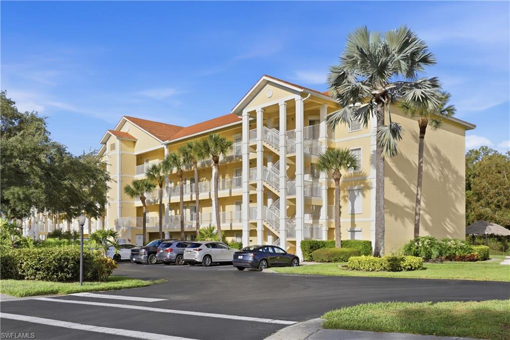 PARADISE ... FOUND!  Truly a sparkling COASTAL GEM ... in sought-after CORAL FALLS RESORT!  ... 2027 SEASONAL RENTAL BOOKING-INCOME IN PLACE AND WILL TRANSFER TO NEW OWNER!!! This charming 2 BR/2BA condo home is light and bright, with an AMAZING view of the resort-style pool and nature-preserve.  Newly updated with DESIGNER FURNISHINGS & DECOR --- and feels like new construction, with quartz countertops, white shaker-style cabinets, stainless appliances, neutral colors, and low-maintenance hardwood floors throughout.  TURNKEY FURNISHED with everything you need to move in ... linens and towels, kitchenware and glassware, SMART-TVs, even beach chairs and umbrellas!  Just bring your toothbrush --- and leave your toolbox behind!  Because there's NEW AC (2021), new washer/dryer (2022) and FRESH PAINT throughout (2025)! SPLIT FLOOR PLAN offers extra privacy, with a spacious primary suite and generous second bedroom. CORAL FALLS RESORT offers low condo fees, and superb amenities,  including a resort-style pool with waterfall and heated spa, tiki huts with grills & picnic tables, a cabana, lush landscaping, and plenty of parking.  There's no community in Lely Resort offering better walkability! You're just minutes from the PUBLIX grocery store, Starbucks, Chipotle, Miller's Ale House, Jersey Mike's, Texas Roadhouse, and many more restaurants, and Planet Fitness, HomeGoods, several banks, a dentist, spa services/nail salons, and more!  Public golf in Lely Resort is nearby, with two 18-hole championship courses rated among the Top 50 in the U.S. ... AND you are only a 15 minute drive to MARCO ISLAND to the South, or DOWNTOWN NAPLES to the North.  Investors or part-time retirees looking to pick up additional income will love this INVESTMENT opportunity as WEEKLY RENTALS ARE ALLOWED, providing a STRONG INCOME potential ($30K+/yr) ... PLUS, THIS HOME has a booking history of up to 5 1/2 months of full-occupancy per year.  As well, you will have optional access to the fabulous PLAYER'S CLUB amenities nearby with 3 resort-style pools, 3 restaurants, sports courts, spa services, and more, all with payment of a one time initiation fee and monthly dues. For convenience, style, amenities, and comfort ... THIS HOME HAS IT ALL!  Whether you're looking for a coastal oasis, or a savvy investment, or both, this is your chance to own a truly charming home and one of the best values in Lely Resort!