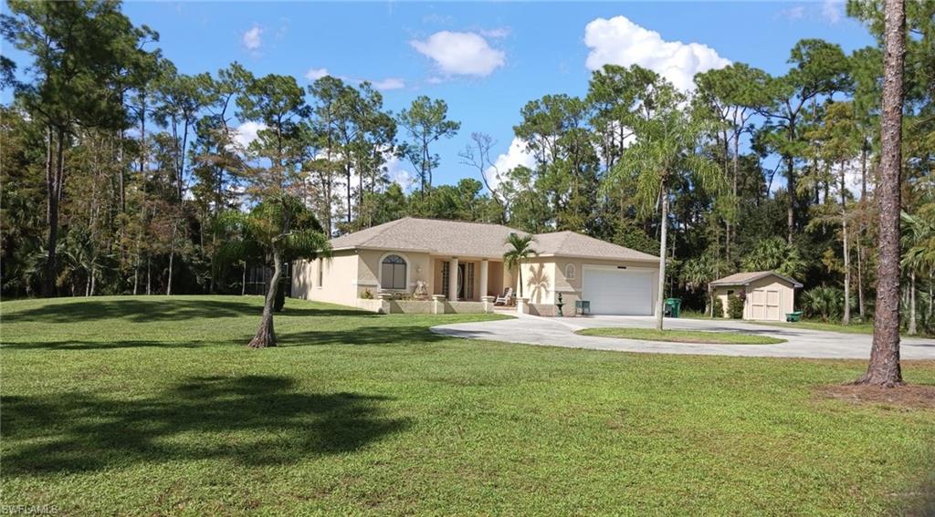 3 bedroom 2 bath home, impressive 2.5 acre property, functional kitchen, 2 car garage, private pool and oversized lanai, nearby shopping and retail. Spacious residence, a property with room to enjoy the outdoors. No HOA.