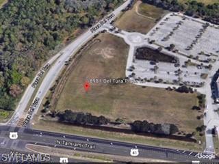 Great frontage and visibility on US 41 N. Tamiami Trail. CORNER COMMERCIAL OUTPARCEL  property in Del Tura Plaza in North fort Myers with 210 feet of frontage right on US 41. AADT 50,000 Vehicles,  Median Cut 4 lane intersection,  Del Tura Plaza CDP Land Use Suberb.   This 1.41 acres site has approvals in place for over 9,805 sq.ft of restaurant or commercial space per the Commercial Planned Development. County water, sewer, and drainage systems in place. Ready to develop?  Call for information on CDP and zoning.  perfect for medical business with all the developed  housing communities nearby.  Hot growth area!   ADD 2006-0017.   LDO 2005-0021.   Resolurtion Z-88-152.