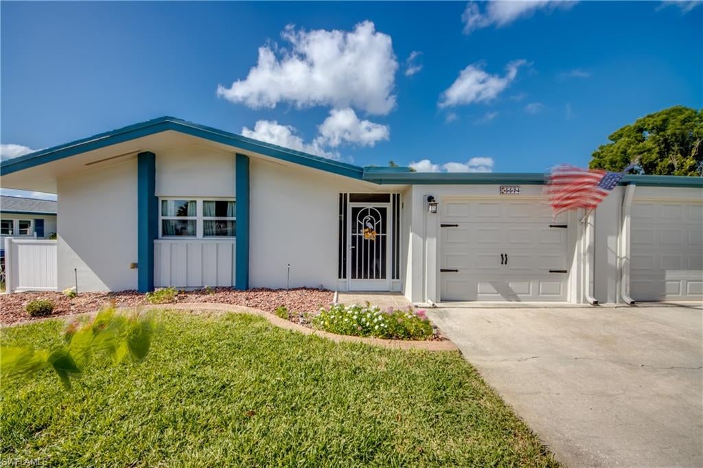 WHAT IF YOUR NEXT ADDRESS CAME WITH MORE SUNSHINE AND LESS TO-DO LIST? At $249,900, 5574 Hamlet Ln makes a pretty compelling case for calling SOUTHWEST FLORIDA home! Whether you’re looking for a year-round haven, a seasonal escape or a place to put down roots, this spacious 2-bedroom, 2-bath villa in WHISKEY CREEK offers 1,775 SQUARE FEET UNDER AIR, an attached 1-car garage and the freedom to spend more time enjoying life than maintaining your home. Because isn’t that the point of living in paradise? LET’S TALK ABOUT WHAT’S ALREADY BEEN DONE! A 2024 dimensional shingle roof, flat roof and gutters, 2020 HVAC with UV filter, air scrubber INCLUDING ductwork, 2020 mini-split, 2021 water heater, 2011 windows (prior owner), 2025 exterior paint, 2022 interior paint and a 2022 surge protector. Add updated faucets, electrical switches, exterior doors, handles, hardware and locks, PLUS solid CONCRETE BLOCK CONSTRUCTION. That’s a whole lot of improvements you won’t have to put on your own project list! INSIDE, THERE’S ROOM TO LIVE YOUR WAY. The inviting GREAT ROOM FLOOR PLAN features crown molding and PORCELAIN TILE FLOORING THROUGHOUT. No carpet! The kitchen is dressed in beautiful bisque cabinetry, granite countertops and a full granite backsplash. The primary bathroom has been updated with complementary finishes, and the guest bath has several updates, too. NEED A LITTLE MORE ROOM FOR THE THINGS YOU LOVE? You’ve got it! The LARGE, AIR-CONDITIONED FLORIDA ROOM is included in the 1,775 square feet and ready to become your TV retreat, hobby headquarters, exercise space or favorite place to unwind. The HUGE laundry room delivers something you’ll appreciate every day: generous cabinets and shelving for keeping life organized. Even the attached garage gets a polished touch with its EPOXY-FINISHED FLOOR! OUT BACK, your LARGE PAVER PATIO overlooks beautifully landscaped common grounds with welcome privacy from neighbors. Morning coffee, an evening breeze, a little fresh air… WITHOUT ADDING YARD WORK TO YOUR WEEKEND! This intimate 55+ community offers a HEATED POOL, shuffleboard and lots of pool side social gatherings. The $475/mo HOA fee includes landscaping, fertilizing, pest control, exterior care and community amenities. Prefer golf? Whiskey Creek Country Club is just blocks away, with public golf, dining and social activities. Memberships are OPTIONAL, not mandatory. NOW, ABOUT THAT LOCATION! You’re approximately 10 MILES FROM FORT MYERS BEACH, 13 MILES FROM RSW AIRPORT and 15 MILES FROM SANIBEL ISLAND! Beaches, island adventures, convenient travel, shopping, restaurants, spring training baseball and entertainment are all part of the SWFL lifestyle. NO PRIOR FLOODING AND NO FLOOD INSURANCE REQUIRED! What if you could have the SPACE you want, the UPDATES you appreciate and the LOCATION you love, without a honey-do list? At $249,900, this isn’t just an affordable place to live. IT’S YOUR CHANCE TO ENJOY THE SOUTHWEST FLORIDA LIFESTYLE YOU DESERVE… HASSLE-FREE!