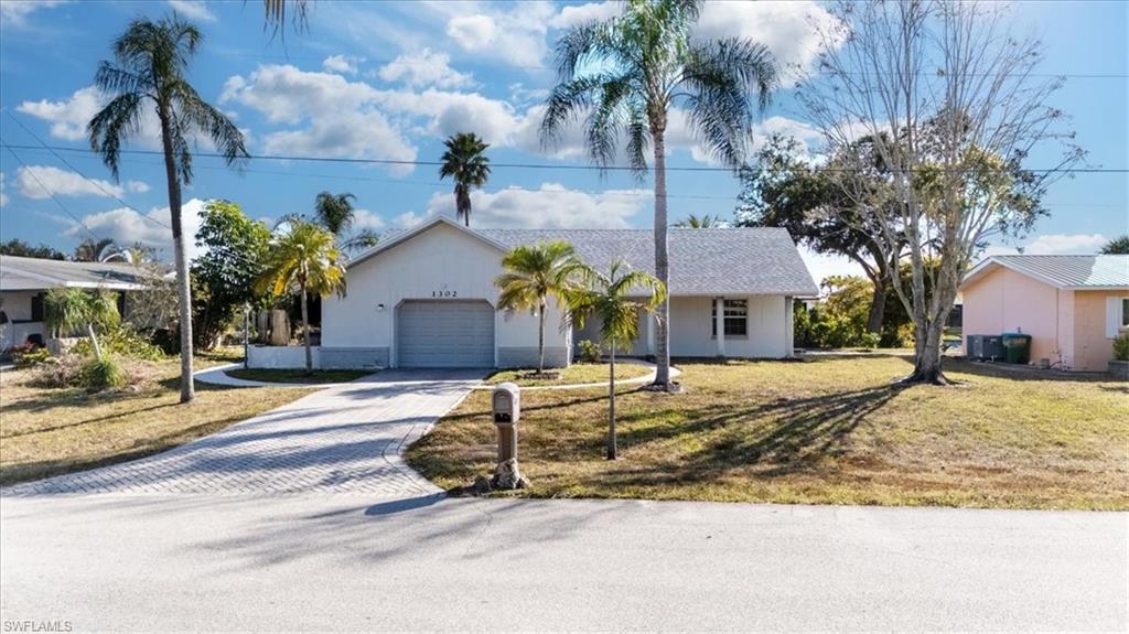 FIVE single family HOMES, one is offered for $299900 fresh water canal & POOL !  TWO are offered @ $235,000 , two are Leased until August 2026 - 738 NE 7th Ave. @ $1650 & 2304 NE 23rd Pl. @ $2200. The oldest roof is 2012 and 2 roofs are METAL. The asking price is buying these homes @ about 80% of value!!! The Seller will pay off ALL the Water/Sewer assessments (approx. $60,000?). (2304 NE 23rd Place is one of the homes with assessment due & system is to be installed in late 2027/2028. Its a 3 lot site, so its about $46,000 will be due on it & that is part of the $60,000?)