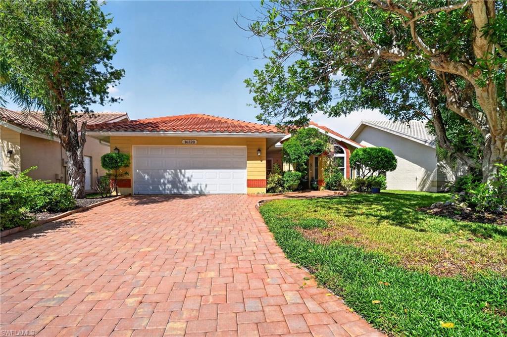 CUSTOM VILLA HOME IN THE HEART OF KELLY GREENS.  Completely and professionally renovated four years ago, this home has the great combination of fantastic location and excellent vegetation. From the o pen kitchen with granite and stainless steel to the porcelain tile floors, everything blends seamlessly and tastefully for the ultimate in comfortable living.  Some of the upgrades include paver driveway, hurricane glass, redesigned kitchen and primary bathroom, enclosed back lanai, and open back paver deck.  
Kelly Greens is a private, gated, golf and country club featuring a championship par 72 golf course, top notch tennis facilities, completely resurfaced pool and dining that is an event every time.  Located just minutes from the world famous beaches of Sanibel, Ft Myers Beach, and just a short bike ride from Bunche Beach, Kelly Greens is the perfect location...we live in our own little bubble.  Come experience the Florida Lifestyle the Kelly Greens way in this easy living home.