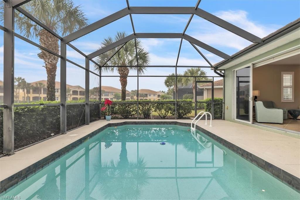 Welcome to this extraordinary home in the prestigious Pelican Preserve community! This immaculate villa home is move-in ready, updated, painted, cleaned, turnkey, and priced to sell fast. The sparkling pool is an inviting oasis with a pond view beyond. The granite counters in the kitchen add a touch of elegance, while the new appliances make meal prep a breeze. The hurricane glass windows and doors provide peace of mind, and the plantation shutters and tile floors in the living area create a stylish and comfortable space for relaxing or entertaining guests.  The master bedroom is a true retreat with new carpet and a bathroom with dual sinks plus a closet with built-ins. The guest area has a new bed, new carpet, and privacy curtain to divide the area from the great room. With a new roof in 2025 and a stunning expanded Milan floor plan, this home is truly a gem in Pelican Preserve.  Pelican Preserve is a 55+ community that is amenity-rich with pickleball, tennis, cypress preserve trails, dog parks, bocce ball, fitness center, spa, craft rooms, dining, music, pools, butterfly garden, softball, and much more. Don't miss your chance to own this slice of paradise!
