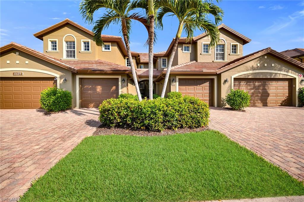 Enjoy peaceful private views of the Classics Golf Course and lake from this beautifully furnished second-floor Osprey-floor-plan residence in Alden Woods at Lely Resort. Ideally positioned along the 9th hole, the home offers stunning golf course scenery, a spacious layout and deeded Players Club membership. Impact doors and windows provide peace of mind, while the screened lanai, with tile flooring, ceiling fan and a large covered outdoor living space, creates the ideal backdrop for relaxing and entertaining. Inside, the bright and inviting interior features diagonal tile flooring throughout the main living areas, vaulted ceilings and white plantation shutters that enhance the coastal aesthetic. The kitchen is stylish and functional, offering granite countertops with full matching backsplash, recessed and under-cabinet lighting, a pantry, a breakfast bar and stainless steel appliances, including a range, microwave, dishwasher and a newer refrigerator with icemaker. A casual dining area sits just off the kitchen, complemented by an adjacent formal dining room with a tray ceiling. The living room showcases architectural display niches and sliding glass doors that open wide to the lanai, ideally framing the relaxing golf and fountain views. The owner’s suite is a welcoming retreat with a double-door entry, lanai access, a large walk-in closet, and an en-suite bath featuring a dual granite vanity with a full-width mirror, an accessible shower with floor-to-ceiling tile and a glass enclosure, and a separate soaking tub. Two guest bedrooms provide comfort and flexibility, one with an accent wall and ledge, the other with its double-door entry, both conveniently near a full bath with a shower-tub combo. Additional features include a laundry room with overhead cabinetry, a Speed Queen top-load washer and a Speed Queen front-load dryer, as well as an attached one-car garage. Alden Woods offers a community pool and clubhouse just moments away, and the property carries no CDD fees. Enjoy full access to the renowned Players Club & Spa, where resort-style living includes lagoon-style pools, an expanded tiki bar, a full-service spa and salon, a state-of-the-art fitness center, tennis, pickleball, bocce and multiple dining options, from casual poolside fare to refined culinary experiences. Lely Resort also features three championship golf courses, with two public courses (Mustang and Flamingo) and one private course (The Classics), offering membership opportunities. All this is just minutes from downtown Naples, Marco Island, award-winning beaches, fine dining and shopping.