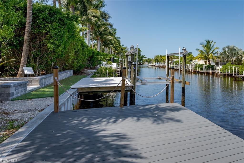 Lot 18 – Waterfront Paradise in Naples Motorcoach Resort, Welcome to your own slice of tropical paradise inside the prestigious Naples Motorcoach Resort, one of Southwest Florida’s most sought-after luxury motorcoach communities. This exceptional canal-front property with private dock offers the rare opportunity to create a custom waterfront retreat designed entirely around your lifestyle. Imagine stepping outside your coach to the gentle shimmer of the canal, coffee in hand, as the Florida sun rises over swaying palms. Your oversized dock becomes the perfect place to relax, entertain, or keep your boat ready for adventure. From here, you’ll enjoy indirect Gulf access by boat, cruising through peaceful mangrove estuaries and past the natural beauty of Rookery Bay National Estuarine Research Reserve on your way to the open waters of the Gulf of Mexico.
Spend the day exploring the legendary waters of Southwest Florida. Idle through the mangrove tunnels of the Ten Thousand Islands, drop anchor for shelling and swimming at Keewaydin Island or cruise over to Tigertail Beach for a relaxing afternoon on sugar-white sand. Boat to lunch along the waterfront of Marco Island, or head north to explore Gordon Pass and the charming dining scene of Naples. The journey from your dock to the Gulf takes roughly thirty scenic minutes and every moment of it feels like a postcard.
Back at your property, the lot itself is a blank canvas ready for your dream design. Enjoy the lush green space as it is, or transform the homesite into a tropical showpiece with pavers, a custom tiki hut, outdoor kitchen, lush landscaping, or even a casita. The current owner has already worked with an architect to create concept plans that may be used or modified, giving you a head start toward building your personal oasis.
Ownership in Naples Motorcoach Resort means enjoying a lifestyle that feels more like a private tropical club than a resort. Residents enjoy a stunning infinity-edge pool overlooking the lake, relaxing hot spa, fitness center, men’s and women’s saunas, and a beautifully appointed clubhouse with a full kitchen for social events and private gatherings. Two additional satellite pools with their own spas, restrooms, and laundry facilities offer convenience throughout the community. Stay active on three pickleball courts, socialize with neighbors at community events, or take your four-legged companion to the resort dog park.
This Class A motorcoach-only community is known for its beautifully maintained grounds, tropical landscaping, and friendly luxury lifestyle that keeps owners returning season after season.
Whether your vision includes peaceful sunset evenings on the dock, boating adventures through the mangroves, or designing a stunning tropical retreat around your motorcoach, Lot 18 offers the rare opportunity to create something truly special in one of Naples’ most coveted motorcoach resorts.
Waterfront… boating… tropical luxury… and endless possibilities await.