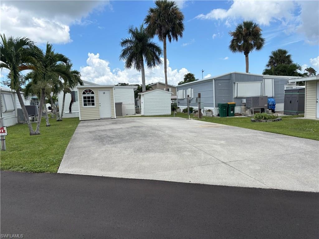 DON'T MISS THIS RARE OPPORTUNITY FOR AN RV LOT IN ONE OF THE FINEST 55 PLUS PARKS IN NAPLES FLORIDA. ENCHANTING SHORES OFFERS A MULTITUDE OF AMENETIES INCLUDING GULF OF AMERICA ACCESS. THERE ARE MANY CLUBS, FUNCTIONS AND NUMEROUS ACTIVITIES WITH SOMETHING FOR EVERYONE. BRING YOUR MOTOR COACH OR FIFTH WHEEL AND ENJOY BEAUTIFUL SOUTHWEST FLORIDA AT THE MOST AFFORDABLE AND WELL MAINTAINED COMMUNITIEES OF ITS KIND. THIS RV LOT FEATURES A CONCRETE SLAB IN NEARLY PERFECT CONDITION ALONG WITH A STORAGE SHED FOR BIKES, FISHING POLES ETC. FEILD MEASURMENTS OF THE SLAB ARE ESTIMATED TO BE 280" WIDE BY 650" LONG WITH AND ADDITIONAL 96" THAT ACCOMODATES THE ADORABLE SHED. THERE WOULD ALSO BE AN OPPORTUNITY FOR A NEW PARK MODLE HOME TO BE PLACED.