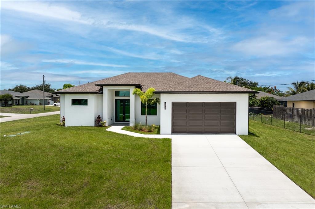 Discover this spacious single-family home featuring 4 bedrooms and 3 full bathrooms, situated on an oversized corner lot in one of Lehigh Acres' most desirable neighborhoods. The modern kitchen boasts granite countertops and will be equipped with brand-new stainless steel appliances. The luxurious master suite includes a private bathroom with dual sinks, a large walk-in shower, and his-and-hers walk-in closets. Additional highlights include a two-car garage offering ample storage space, as well as impact-resistant windows and doors for enhanced safety and peace of mind. With construction now complete, this home is ready for immediate occupancy. Enjoy proximity to shopping centers, dining establishments, boating facilities, and all the best that Southwest Florida has to offer. Don't miss the opportunity to own this incredible property!