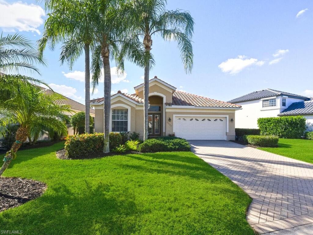 Welcome to this warm and inviting single family residence in the Tivoli neighborhood of the renowned Miromar Lakes Beach & Golf Club.  Designed for comfortable SWFL living, this home offers 2 bedrooms plus a versatile den, 2 baths & attached 2 car garage.  The kitchen features an eat-at bar along with (2) separate dining areas, while the den provides flexible space for a home office, guest accommodations or additional sitting room.  Natural light fills the home creating a relaxed atmosphere from the moment you enter.  With SW exposure, you will enjoy the screened lanai, where a peaceful water view and fountain create the perfect backdrop for morning coffee, afternoon relaxation or cocktails at sunset.  Owners have the option to build a private pool/spa or extend the lanai to create additional outdoor entertaining space personalized to you.  Combined with a 2024 roof, buyers can enjoy both flexibility and confidence in this investment.  As a resident of Miromar Lakes, you will enjoy access to the exceptional resort-style lifestyle featuring 700 acres freshwater lakes, miles of sand beaches, boating and water sports, 2 marina areas, tennis, pickleball, bocce, putting green, children's play area, full service spa & fitness, infinity pool and spa and more.  Dining options include the main clubhouse with indoor/outdoor bars and dining areas, private dining space and the casual and very popular Blue Water Beach Grill overlooking the lake.  Membership at Miromar Lakes Golf Club is optional.  Conveniently located near RSW Intl Airport, shopping, dining, entertainment and many of SWFL's most popular destinations.  This home offers an exceptional opportunity to enjoy the Miromar Lakes lifestyle!