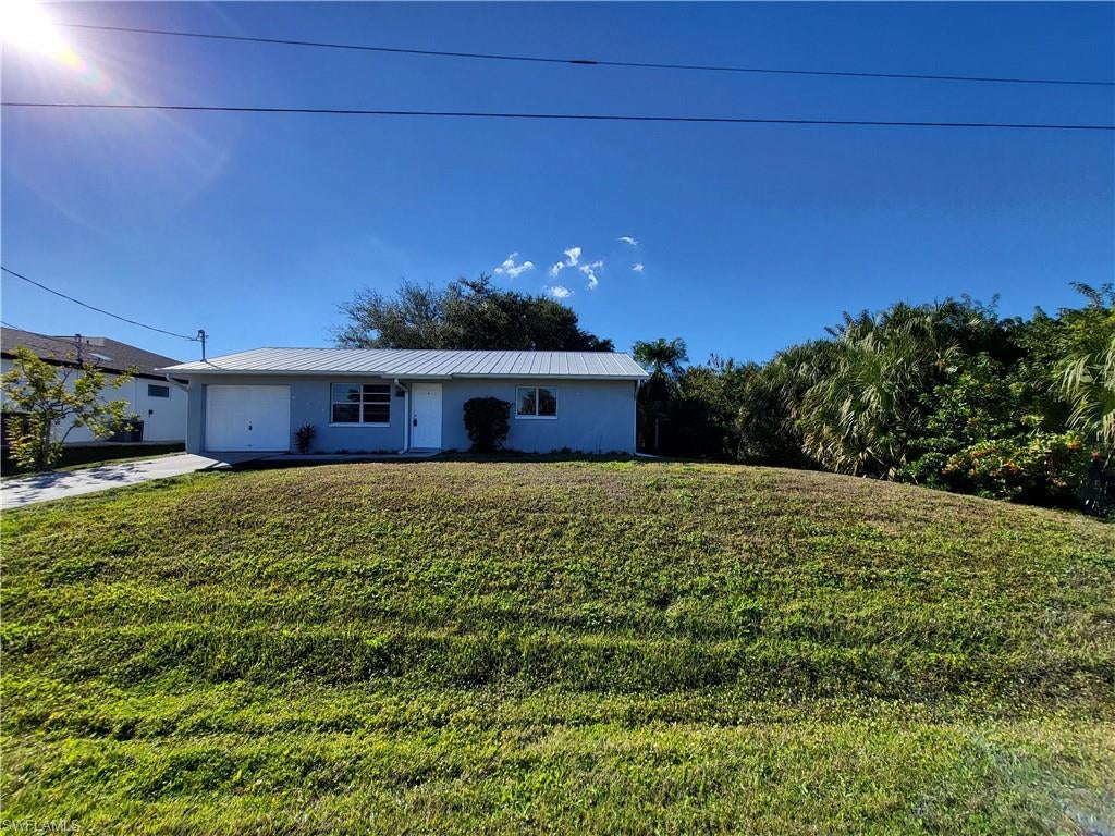 Remodeled spacious 2BR 2BA house in Buckingham Area with garage! 
This home is in a the very desirable Buckingham area of Fort Myers, FL. This charming home boasts two spacious bedrooms and 2 full bathrooms, perfect for comfortable living. The kitchen is a chef's dream, equipped with modern stainless steel appliances that add a touch of elegance and sophistication. The property also includes a water system with maintenance included, ensuring a hassle-free experience. The Buckingham area is known for its vibrant community and convenient location, making it an ideal place to call home. Experience the best of Fort Myers living in this delightful home. Pets allowed with deposit.