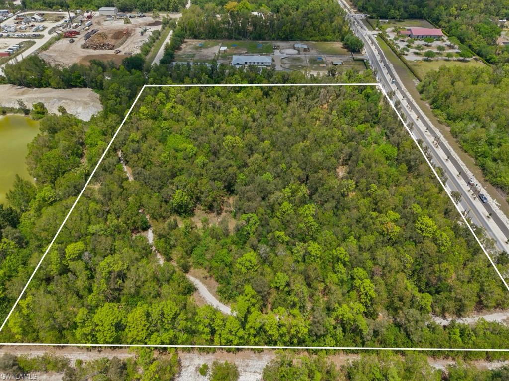 Discover an exceptional opportunity to own 8.89 acres in a desirable area of Bonita Springs,—positioned in a rapidly growing and highly desirable corridor. This prime parcel is located west of Bonita Grande Drive with approximately 660’ of direct frontage offering excellent visibility and accessibility.   In addition to Bonita Grande frontage, Tower Road is located at the NW corner of the property.  The Bonita Grande corridor has numerous new development projects such as Midtown at Bonita (Mixed Use Development), Solis Grande and Vivid Shores, and in close proximity to a Bonita Springs Fire Control Center, and a convenient Publix-anchored shopping center, this property is poised for strong future value. Whether for investment, agriculture, equestrian, or a private estate, this rare offering combines location, size, and growth potential in one of Southwest Florida’s most sought-after areas.  The older electrical panel, associated with a home previously on the property, remains.  Properties of this size, in this location in Bonita Springs, are becoming increasingly rare.