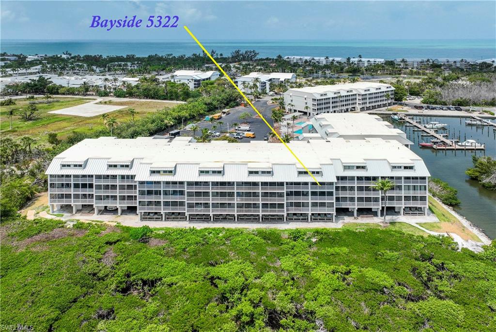 SW FL has it all-- sunshine, culture, and endless recreation! From the Red Sox & Twins stadiums, beaches, boating, tours, and convenient access to an international airport, this is a perfect getaway destination.  While you're enjoying everything SW FL has to offer, don't miss the chance to own a top floor, 3-bed/3-bath townhouse retreat in Bayside Villas, located within the gated South Seas Island Resort on Captiva Island.  The private lanai showcases breathtaking, direct views of sunrise over the Bay, Pine Island Sound & beyond.  Low green mangroves provide natural erosion protection and serve as a thriving habitat for local wildlife--beautiful, serene, and uniquely Florida.  Watch boats glide in and out of the canal leading to the marina, adding a touch of coastal charm to your daily view.  Take a short walk to the beach, feel the sand between your toes, and enjoy unforgettable sunsets.  You're also just steps from the post office, bank, ATM, Captiva shops, and restaurants.