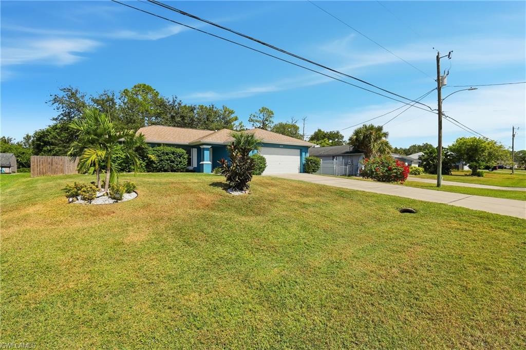 Price Reduction!! Location, Location, Location! Fantastic opportunity.  Fall in love with this stunning stater home! If you’re looking for a peaceful retreat free from the rules and regulations of an HOA, this 3-bedroom, 2-bath, 2-car garage home is perfect for you. The extra-large lot, featuring mango and starfruit trees, backs up to a preserve—so the only neighbors you’ll have behind you are the wildlife that call the woods home. The yard is fenced on three sides to preserve the view of the lush tropical landscape, which flows seamlessly into the large open living space through beautiful French doors. Features vaulted ceilings, tile flooring, and expansive windows, the home feels light, bright, and inviting. The spacious, remodeled island kitchen features all stainless steel LG appliances, a wine fridge, brand-new custom cabinetry, and ample counter space. The generous owner’s suite offers laminate flooring that continues throughout the bedrooms, along with a large ensuite filled with natural light. Two additional bedrooms and another well-lit bathroom complete this lovely home. Additional features include a workspace off the living room, a separate laundry room with a Maytag washer and dryer, a new water heater, a new A/C, and a Culligan water purification system. Located in a "no flood zone" area and just a short drive to Publix and all the best the "Cape" has to offer, this home combines comfort, convenience, and tranquility. Seller Motivated!