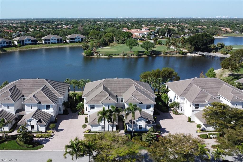 * IT’S ALL ABOUT THE VIEW - ONE OF THE BEST IN THE ENTIRE COMMUNITY * - Sit back and relax on your spacious lanai while taking in the amazing sky filled Sunsets. This condo's location provides for an *EXPANSIVE SOUTHWEST VIEW* of the entire Lake providing stunning Lake, Bridge and Golf Course views. No need to drive to the Clubhouse/Grill Room or RCC amenity center - you are within walking distance. Enhancements are many and include : A remodeled kitchen ($15,000) with newer granite tops, stainless steel sink, tiled backsplash, white cabinetry with premium hardware and premium appliances. A neutral color throughout the interior, newer window treatments, and newer electric hurricane lanai shutters, tiled lanai flooring and much much more, to many upgrades to list - Realtors see attached Upgrade List. All residents are members of the RCC at *NO EXTRA COST featuring a resort style pool, 75' Olympic lap pool, new $2m+ dollar attended fitness center, 8 lighted Hydro-Clay tennis courts, 5 bocce ball courts, 4 Pickle ball courts with (4) more in the planning stage. Also available is a newer refreshed Grill Room and Formal Dining Room along with the 27 hole Gordon Lewis Championship Golf Course ( capped at *375 members ) with its newly completed 8m+ restoration. Palmira also offers its residents at no additional cost or membership requirement dining privileges at the new pool restaurant the Bistro. The new Health and Wellness Center and pool restaurant ( The Bistro ) are now opened for your enjoyment !