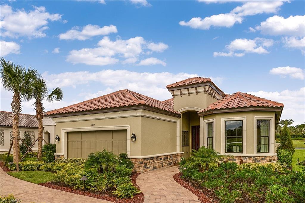 Under Construction - The open well designed luxury home lends itself to entertaining with friends and family with many beautiful outdoor living features. The  upgraded kitchen with a separate prep island is definitely the hub of this home. It comes complete with granite, stainless steel gas appliances, 42” upper cabinets and butler pantry. It has a two car with 4 ft extension, extended  lanai with pool waterfall and summer kitchen rough with gas stub-out for outdoor kitchen. Beautiful  Pool area  with pavers.and beautiful upgraded tile floors throughout  in main living area and carpet in bedrooms. Very popular floorplan in sought after location. . Show and sell.Photos of Model Home. Ready in Fall!