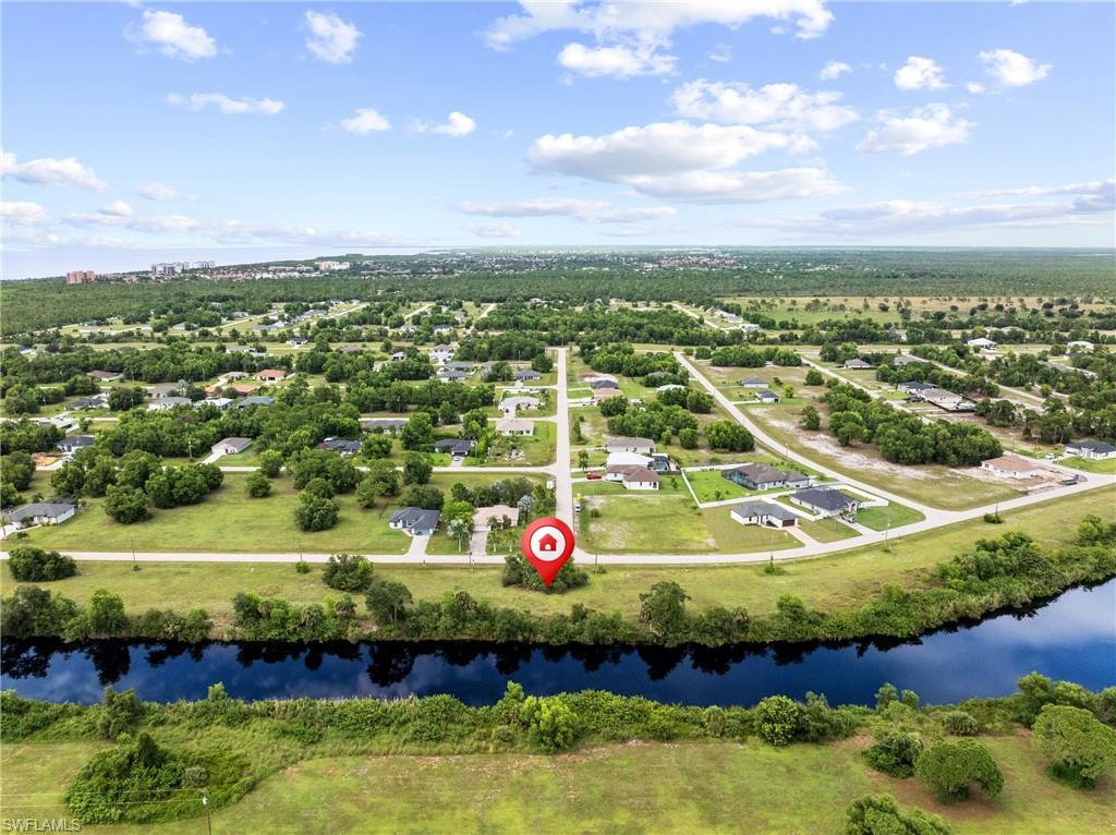 Don’t miss this opportunity to own an oversized .35-acre triple lot on the Dewberry Canal in growing NW Cape Coral. With freshwater canal frontage, southern rear exposure and no HOA restrictions. Convenient access to both Southwest Florida International Airport and Punta Gorda Airport. Enjoy the Florida lifestyle with fishing, boating, kayaking and biking nearby, plus convenient access to public boat ramps, boat storage, golf courses, dining and retail. The location puts you close to Tropicana Park and Crystal Lake Park, as well as the planned Gulf Gateway Resort and Marina Village within the Seven Islands development, envisioned to bring waterfront dining, shopping, outdoor activities and amenities. The new Cape Coral Grove is also planned nearby, bringing additional dining, shopping and entertainment options to the NW.  This property offers you plenty of possibilities for your next Florida home.