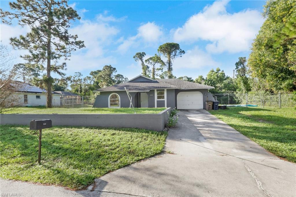 Welcome to this well-maintained 2-bedroom, 2-bathroom single-family home in the quiet and desirable community of Lehigh Acres! Featuring a 1-car attached garage, this home offers comfort, privacy, and plenty of outdoor space. Recent updates provide added peace of mind, including a new well installed in 2025 (approximately 120 feet deep), shingle roof replaced in 2018, HVAC system replaced in 2020, and water heater replaced in 2018. Start your mornings with coffee on the screened-in lanai overlooking the large, fenced backyard—an ideal setting for relaxing, entertaining, gardening, or enjoying Florida's year-round outdoor lifestyle. The practical floor plan offers two comfortable bedrooms and two full bathrooms, making this home an excellent choice for a first-time buyer, seasonal resident, or investor. Move-in ready and full of potential, this property combines important recent updates with a peaceful setting and plenty of room for a pool. Whether you're looking for a place to call home or a property with rental potential, this Lehigh Acres home is worth a look!