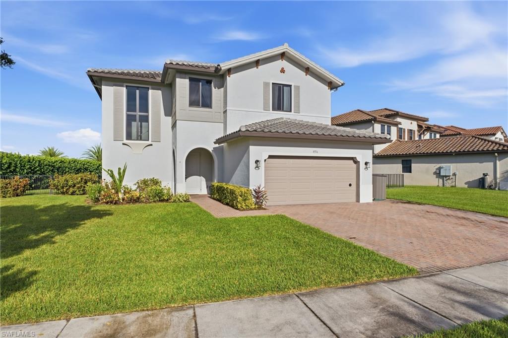 One or more photo(s) has been virtually staged, AI generated or rendered.  4 Bedrooms | 3 Full Baths | 3,300+ Sq. Ft. | Lake View | Western Exposure | Built 2022 | Room for Pool ???? Welcome to this spacious 2022-built Harford model in the desirable Maple Ridge neighborhood of Ave Maria, offering a first floor bedroom, over 3,300 square feet of thoughtfully designed living space with 4 bedrooms, 3 full baths, and a versatile floor plan suited for a variety of lifestyles. Positioned on a picturesque lakefront homesite with coveted western rear exposure, this residence provides front-row views of spectacular Florida sunsets. The newly Fenced Backyard offers privacy, ample outdoor space, and room to add a future pool. Inside, the open-concept design is enhanced by Luxury Vinyl Plank Flooring throughout, recessed lighting on the main level, and an abundance of natural light. The spacious kitchen serves as the heart of the home, featuring bright white raised-panel cabinetry, sleek granite countertops, an upgraded appliance package, and an impressive 10+ foot island ideal for meal preparation, casual dining, and entertaining. The generously sized primary suite includes a private ensuite bath with dual sinks and ample storage. Three additional bedrooms provide flexibility for guests or household members, while a separate bonus room offers an ideal space for a home office, study area, hobby room, or flex space. Additional features include a tile roof, extra-wide paver driveway, concrete block construction, impact-resistant windows on the second floor, and modern finishes throughout. Residents of Maple Ridge enjoy access to an extensive collection of community amenities, including a clubhouse, resort-style pool, Pickleball Courts, two fitness centers, Water Park, Dog Park, walking trails, and a vibrant calendar of recreational activities. Optional golf opportunities are also available nearby. Experience the combination of generous living space, modern construction, beautiful Lake Views, and exceptional amenities that make this Ave Maria property a standout opportunity.