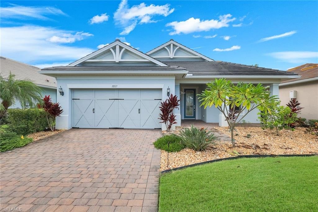 One or more photo(s) has been virtually staged, AI generated or rendered.  
Luxury meets effortless Florida living with thoughtful upgrades and sophisticated finishes. From the gourmet kitchen and elegant interior details to the private solar-heated pool and custom lush tropical landscaping, this residence offers a truly elevated lifestyle. Located within a prestigious 55+ gated community with an impressive array of resort-style amenities and activities.

Welcome to this Martin Ray model offering 3 bedrooms, 2 baths, plus a den. The kitchen features stainless steel appliances, a gas range, walk-in pantry, Butler’s pantry, wine cooler, and under-cabinet lighting. Elegant crown molding and plantation shutters add a touch of sophistication throughout, while new carpet and a new hot water heater in 2026 provide added peace of mind. The spacious garage features epoxy flooring and additional shelving for storage.  * NO CDD and NO FLOOD Insurance required. *
Step outside to enjoy the Florida lifestyle with lush landscaping and a solar-heated pool, creating a private and inviting outdoor retreat. For added storm protection, the home is equipped with an electric metal hurricane shutter. Residents enjoy an impressive amenity center featuring a community pool and spa, fitness center, bocce, pickleball and tennis courts, library, and more. This exceptional home offers the perfect combination of comfort, upgrades, and resort-style living.