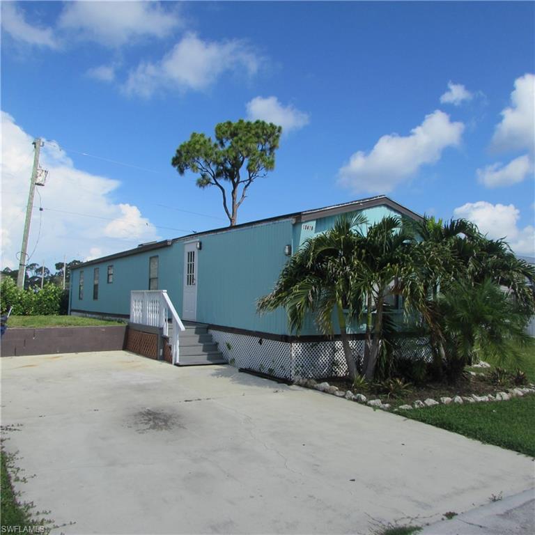 Great location at Pine Island Center... Cute 2-bedrooms 2-baths, Vaulted ceilings, Nice Kitchen/Dining area Wood cabinets for plenty of space, Living area,  Tile floors, Master bath is beautiful with Tiled walls in bathroom Shower & Bath tub, Wood cabinets .. Yard is 43x 80, raised Septic area, palm trees... very easy maintenance . Location is at the center of the Island, Library-school- pickleball & tennis, museum and little league field, also a 20 acre walkaround park... Great location- Check this property today !!