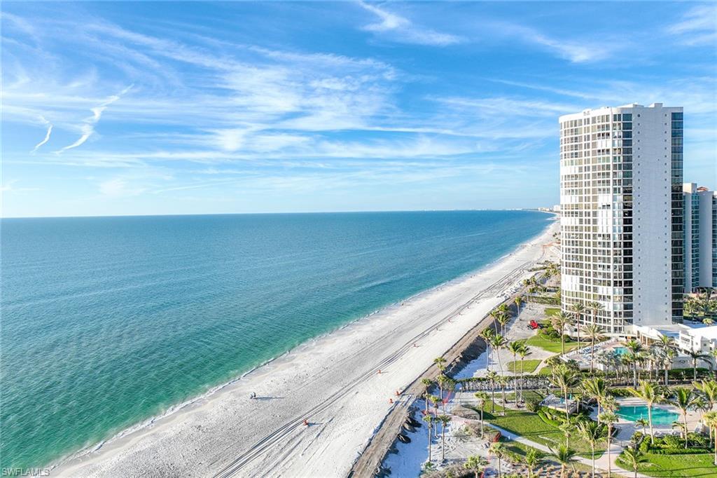 Experience refined Gulf-front living in this 2,753-square-foot residence in the Monaco Beach Club in Park Shore. Positioned on the third floor, this three-bedroom, four-bath home includes two primary suites and showcases a 2017 renovation by Borelli Construction. The open-concept layout offers tile flooring throughout, a wet bar, abundant storage, and custom closets.

The kitchen is designed for both form and function, with quartz countertops, custom cabinetry, a large center island, and stainless-steel appliances. Offered furnished, this residence is equipped with impact-resistant glass and electric storm shutters for added security and peace of mind. A spacious lanai captures western sunset views over the Gulf of Mexico.

Monaco Beach Club residents enjoy exclusive beachfront access with amenities including a heated pool and spa, beachside cabanas, four grilling stations, tennis courts, and secure bicycle storage. Additional services include garage parking, car wash station, 24-hour staffed front desk with an upgraded security system, and concierge support for home watch, vehicle care, and notary services.

Located within walking distance to Venetian Village and minutes from Waterside Shops, Mercato and downtown Naples.