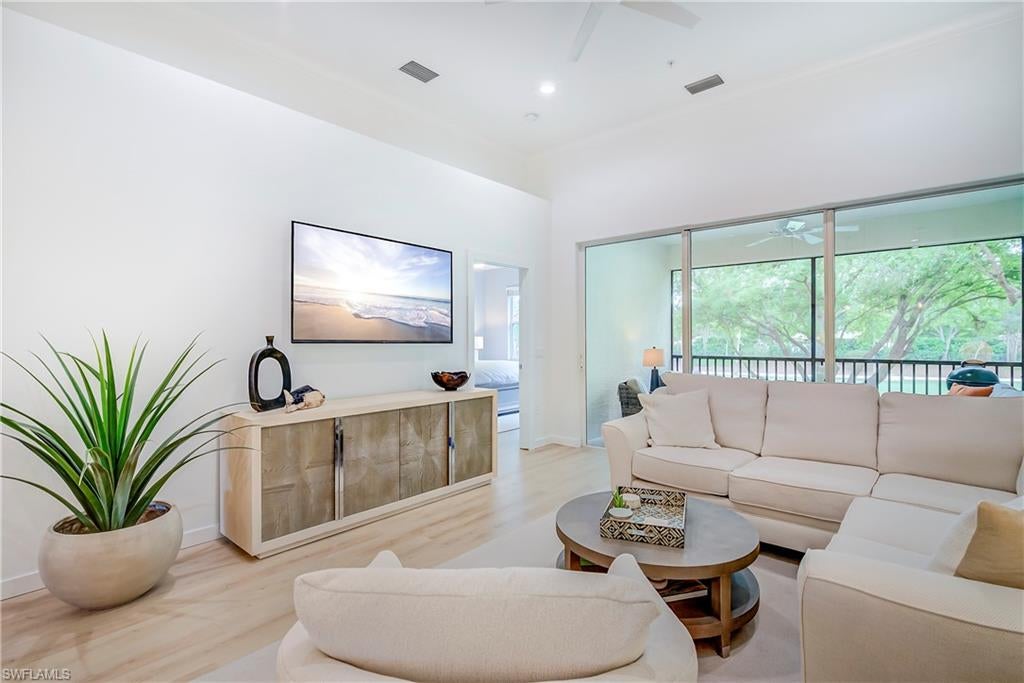 Completely remodeled end unit that shows and feels like a model home—with bundled golf and no waitlist in Vasari Country Club! This two-bedroom-plus-den, two-bath second-floor residence in Trieste features new flooring throughout, new kitchen cabinetry and countertops, and remodeled primary and guest bathrooms. Coastal-inspired finishes and coordinated details create a fresh, cohesive feel throughout.

Volume ceilings and additional end-unit windows fill the home with natural light. The inviting living and dining areas flow into the updated kitchen, featuring white cabinetry, stainless steel appliances, a stylish backsplash, a breakfast bar, and a sunny breakfast nook. A separate den with a window offers flexibility as a home office or additional lounge space.

The spacious primary suite features dual walk-in closets and a beautifully remodeled bathroom with dual sinks and a walk-in shower. A separate guest bedroom and updated guest bathroom provide comfortable accommodations for visitors. Relax on the south-facing screened lanai, with peaceful golf-course views. Laundry in residence and assigned covered parking add convenience. Select furnishings and personal items are excluded. An exclusion list is available upon request.

Enjoy Vasari’s welcoming, active lifestyle with championship bundled golf, an aqua practice range, tennis, pickleball, bocce, a fitness center, pools and a spa, and multiple dining venues, including the popular poolside Taverna. Convenient to beaches, shopping, dining, and RSW International Airport, this beautifully updated residence is ready to enjoy as a full-time home or seasonal retreat.