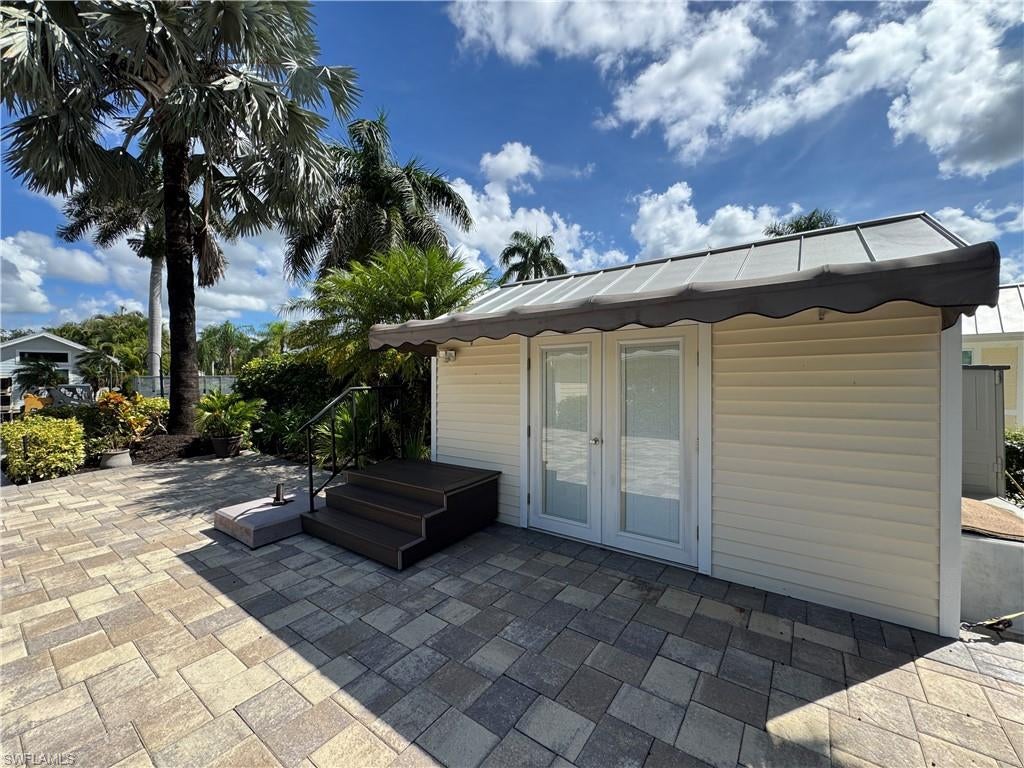 Lot 198 Your Little Piece of the Florida Lifestyle. Lot 198 has that welcoming Florida charm from the moment you arrive. Beautiful landscaping, pavers, and a cozy coach house create a private little retreat that gives you everything you need to start enjoying life at RiverBend Motorcoach Resort. The coach house is compact but thoughtfully designed, with a utility space ready for a kitchenette and refrigerator, a washer and dryer, and a bathroom with a shower and sink. A small closet keeps things neat and organized, while storage containers tucked toward the back of the property provide a convenient spot for landscaping tools and outdoor essentials. And then there’s the way you’ll enjoy the space. Picture sunny Florida mornings and afternoons spent out and about, then coming home to your own little slice of paradise. The front of the lot is perfect for gathering with friends, while the back lanai creates a more intimate setting for an al fresco dinner as the day begins to cool. With the pool just a short stroll away, it’s easy to slip into the rhythm of RiverBend and find yourself right in the middle of the resort’s many seasonal activities. Set along the scenic Caloosahatchee River, RiverBend is where Florida’s best attributes come together — sunshine, warm evenings, beautiful scenery and a community of people who know how to enjoy it. Start your day with water aerobics or a friendly game of bocce. Spend the afternoon relaxing poolside, cooling off in the pool or enjoying a refreshing drink at the cabana bar. Maybe squeeze in a little pickleball on one of the eight courts before heading back to your own private retreat. For the boaters, the river is practically calling your name. With RiverBend’s private boat ramp, you can launch your boat right here and spend the day exploring the Caloosahatchee, enjoying the sunshine, discovering new waterfront spots or simply cruising until it’s time to head home for sunset. As the sun starts to dip, the pace changes but the fun doesn’t stop. Beautiful Florida sunsets give way to evenings filled with friends, laughter and plenty to do. Gather for Taproom Trivia or Texas Hold’em, enjoy live music or a themed event, or settle in along the riverside lanai for an evening of bourbon and cigars. And on the nights when you’d rather keep things quiet, there’s always the simple pleasure of dinner outside, warm breezes and a Florida sky full of stars. Add shuffleboard, riverfront gatherings, tropical landscaping, a private boat ramp and countless places to relax, and you’ll quickly discover that there’s no shortage of ways to enjoy your time here. Lot 198 is your invitation to own a private piece of the Florida lifestyle—where your Class A motorcoach becomes the beginning of something much more it’s your own little Florida retreat. A place to slow down, soak up the sunshine, make new friends, enjoy beautiful evenings and experience RiverBend your way.