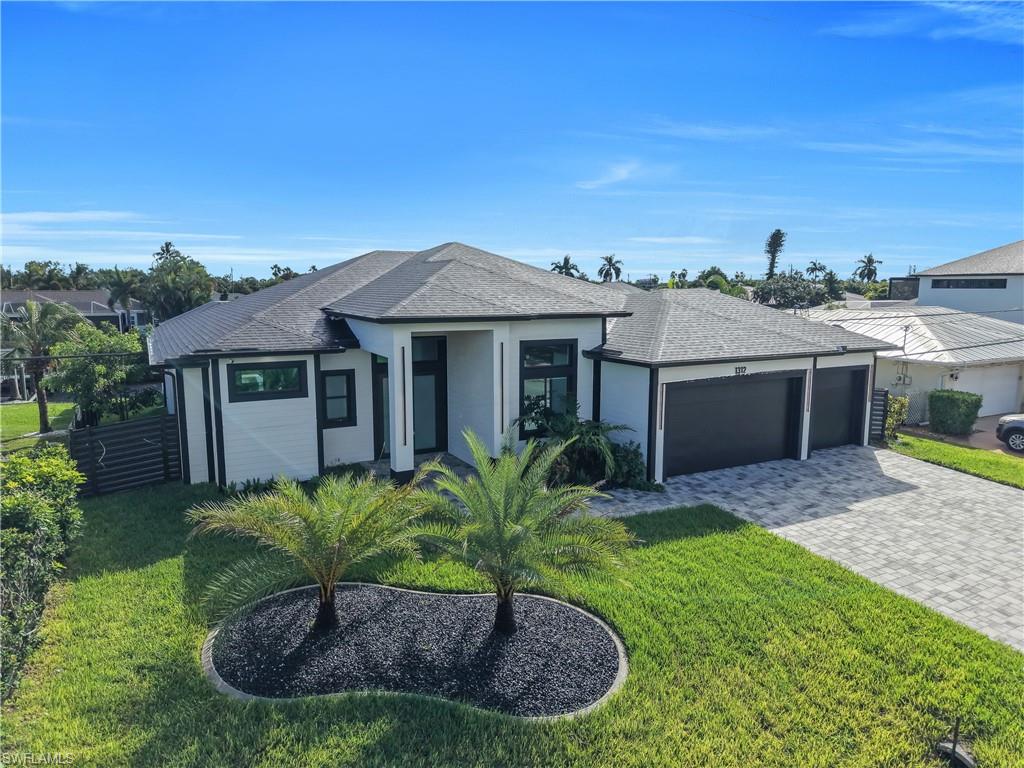 LUXURY GULF-ACCESS NEW CONSTRUCTION | 4 BEDROOMS | 3.5 BATHROOMS | 3-CAR GARAGE
Experience the ultimate Florida waterfront lifestyle in this exceptional new-construction residence, where sophisticated design, luxury finishes, and resort-style amenities come together beautifully. Featuring 4 spacious bedrooms, 3.5 bathrooms, and a 3-car garage, this stunning home showcases high-end finishes throughout, impact-resistant windows and doors, and a desirable Zone X location.
Boating enthusiasts will appreciate the direct Gulf-access lifestyle, complete with a private dock featuring captain’s walkways and a boat lift, making every day an opportunity to enjoy the water.
Step outside into your own private paradise! The fully fenced backyard features a screened-in inground swimming pool and an oversized jacuzzi, equipped with an electric heater for year-round enjoyment. Designed for relaxation and entertaining, this outdoor oasis is the perfect setting for unforgettable gatherings, peaceful evenings, and the ultimate Florida lifestyle.
Inside, discover an atmosphere of refined elegance enhanced by a stylish wet bar, a dedicated wine cooler, and an integrated audio system extending throughout both the interior and exterior of the home. A surveillance system adds an additional layer of convenience and peace of mind.
From its impressive waterfront features to its upscale interior details and exceptional outdoor living spaces, this extraordinary property offers the perfect blend of luxury, comfort, and functionality. Whether you are a boating enthusiast, an entertainer, or simply seeking an elevated Florida lifestyle, this home is a rare opportunity to experience waterfront living at its finest.