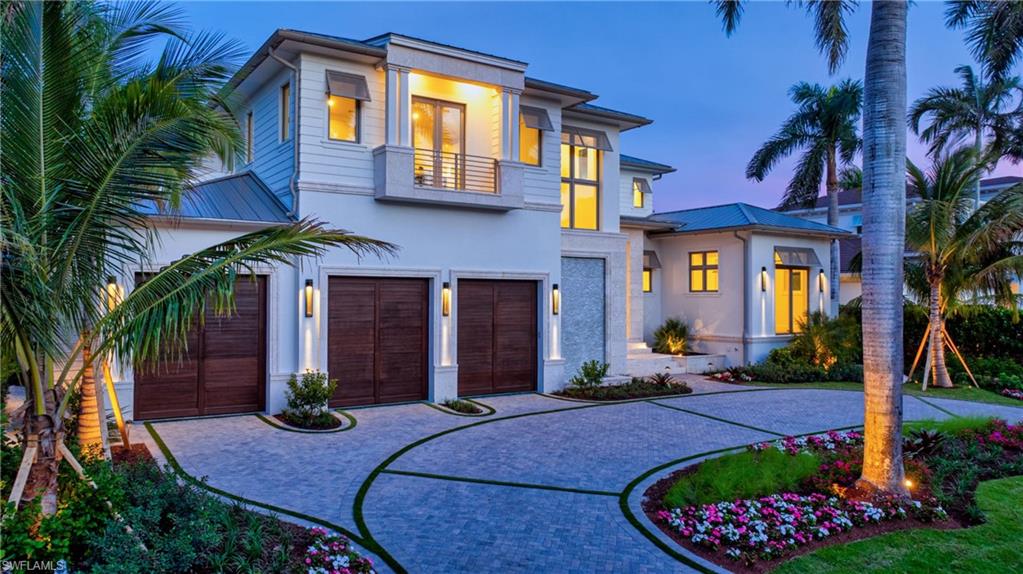 An extraordinary opportunity in the heart of Aqualane Shores, CONSTRUCTION, FURNISHINGS AND CERTIFICATE OF OCCUPANCY COMPLETED JANUARY 2026. This waterfront estate commands one of the area's most coveted settings. Gracious entry set on a rare, oversized lot with 100 feet of frontage at both the street and water, the property enjoys sweeping water views and direct, no bridge access to the Gulf. On a quiet street just steps from Naples pristine beaches and celebrated dining and boutiques of Third Stre026et South, the location is nothing short of exceptional. Designed by renowned architect Jon Kukk and masterfully crafted by D. Garrett Construction. This 6,457 square foot residence embodies refined coastal elegance with seamless indoor-outdoor living. A gracious entry opens to expansive interiors that flow effortlessly to a stunning waterside Lanai, where a rare cut -in boat slip creates an intimate connection to the water-transforming the outdoors into an extension of the living space. Eastern exposure bathes the lanai and patio area in mourning, midday light while providing shade in late afternoon and evening.Built-in electric storm shutters/screens for the lanai and patio area. Additional features include Rufino Cabinetry, HVAC Fresh Air Intake, Humidifier and De-Humidifier, Micro-tile Duct Board for Rigid Air Ducts, Whole House Make Up Air, Kitchen Hood Make Up Air. Wolf 48" Dual Fuel Range, Sub-Zero Refrigerator/Freezer, Sub-Zero 24" Wine Storage, Sub-Zero Refrigerated Drawers, Cove and Miele Dishwashers, Wolf Wall Oven, Wolf Coffee System, Dishwasher and Garbage Disposal in Laundry Room adjacent to Butlers Pantry, European White Oak flooring, Zip System Roof, Gulflok Standing Seam Metal Roof with PVDF Paint Finish. Coffee bar in owners suite with refrigerated drawer’s . Nanny's apartment with separate exterior entrance, kitchen area with full size refrigerator, microwave and sink. Boater enthusiasts will appreciate the exceptional waterfront amenities: Rare 17.4ft x 30ft Cut in Boat Slip plus a New 52 foot long Dock with a fish cleaning station along a new Seawalll accommodating an additional vessel. Outdoor shower completes the coastal life style. Car collectors take note: the True three-stall, Air condition Garage with the ceiling height suitable for vehicle lifts , offering potential parking for up to six cars. Elevator services the garage and both living levels of the home. Home has a 10 foot 1 inch elevation. Custom design, finish in this home represents a uniquely high-level design, construction, finish, interior design and furnishings.
