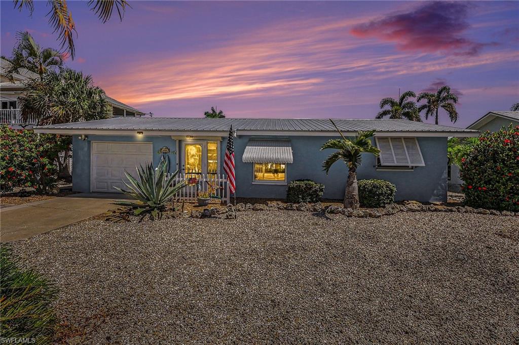 THE BOATER'S WATERFRONT HOME with the following HIGHLIGHTED FEATURES
DIRECT GULF ACCESS • NO BRIDGES • BOAT LIFT • PERMITTED BOATHOUSE/SHED
Block Construction | Metal Roof | Trex Dock | Garage | No HOA

Experience the best of island waterfront living at 3608 Rita Lane—offering coveted Direct Gulf access with no bridges and designed for serious boaters, anglers, and those seeking the relaxed Southwest Florida lifestyle. This charming, mostly furnished 2-bedroom, 2-bath waterfront home sits in one of St. James City’s most desirable boating neighborhoods and blends classic Florida character with valuable upgrades and exceptional marine amenities.
Built with solid block construction and topped with a durable metal roof, this property offers peace of mind, low-maintenance ownership, and the freedom to enjoy island living to the fullest.  
The true highlight is outside, where your waterfront setup is ready to go. Enjoy a permitted boathouse, large boat lift, and an expansive walk-around Trex dock complete with water and electric—creating the perfect environment for effortless boating, fishing, entertaining, or simply enjoying life on the canal. If you want to add a pool, the backyard has room to design your perfect waterside oasis.  With direct Gulf access, your next adventure to Pine Island Sound, outer islands, waterfront restaurants, and world-class fishing grounds is just minutes away.
Inside, the home offers a comfortable, functional layout with 2 bedrooms and 2 full bathrooms, enhanced by timeless terrazzo flooring throughout for durability and authentic Florida charm. Recent improvements include a new air conditioner and water heater, so you can move in and start enjoying the property immediately. The mostly furnished interior makes this an easy transition for seasonal use, full-time living, or an investment opportunity.
Additional features set this property apart, including a one-car garage with excellent storage for tools, fishing gear, and boating essentials, plus a rare 30-amp RV hookup—ideal for guests, extra flexibility, or recreational use.
Best of all—NO HOA, so you can store your toys, enjoy your property your way, and fully embrace the waterfront lifestyle without added restrictions or fees.
Whether you're searching for a winter retreat, full-time island residence, or the ultimate boating getaway, 3608 Rita Lane delivers direct Gulf access, outstanding dockage, quality construction, and the laid-back Florida lifestyle buyers dream about.