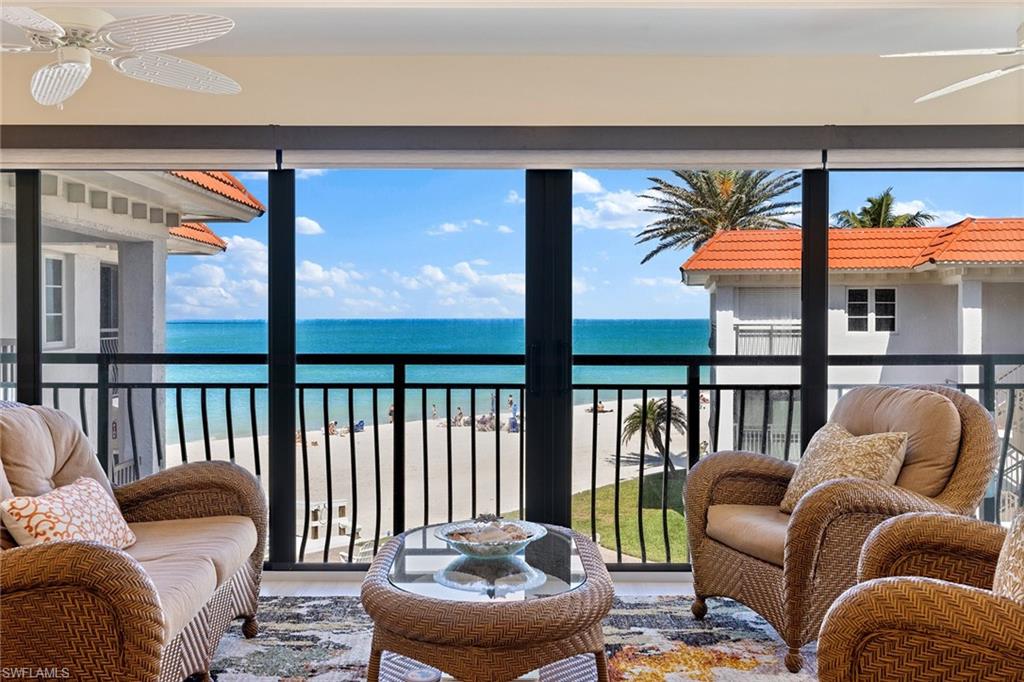 Enjoy panoramic Gulf views from every room in this fully renovated beachfront residence at Southern Clipper, a boutique 30-home community in The Moorings. Designed for effortless seasonal living, this turnkey two-bedroom, two-bath home offers impact-rated sliding glass doors, coastal furnishings, granite countertops, new GE Profile kitchen appliances, tile flooring throughout, and in-unit laundry. Two deeded covered parking spaces and additional storage enhance functionality, while beautifully updated interiors provide comfort and style. Watch dolphins, sea birds, and unforgettable Naples sunsets from your private perch above the shoreline. With direct beach access and a beachside pool, the outdoor experience is just as inviting. Located less than a mile from Venetian Village and minutes from Old Naples, Southern Clipper offers a rare blend of Gulf-front tranquility, hurricane-resilient infrastructure, strong financials, and low fees. Ideal for the discerning buyer seeking a low-maintenance, luxury retreat with stunning Gulf views.