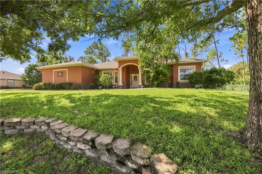 Price Improvement!! NORTH PORT POOL HOME ON A DOUBLE CORNER LOT — NO HOA, NO CDD & ROOM FOR THE RV/BOAT! Welcome to Florida living with space, privacy and upgrades! Ideally located near the new Imagine Schools and just moments from I-75 Exit 179, this former model home sits on a large double corner lot surrounded by mature trees, wooded areas and a tree-lined canal along the side of both lots, creating exceptional privacy. The outdoor space is made for enjoying the Florida lifestyle! A south-facing, heated saltwater pool built in 2021 features recently installed pool lights, while the expansive cleared yard offers plenty of room for entertaining with a firepit, grill pad, in-ground hot tub and a separately fenced side yard for your four-legged friends. Need room for the toys? A 40' x 12' RV/boat parking slab is conveniently located just off the driveway. Inside, this thoughtfully designed split floor plan offers 3 bedrooms plus a versatile 4th bedroom/office featuring a built-in desk and its own half bath—an ideal private work-from-home space. Two guest bedrooms and a full bath are located on one side of the home, while the spacious primary suite is privately situated on the opposite side. Tray ceilings in the living room, den and primary bedroom, tile throughout the main living areas, 42" upper kitchen cabinetry and Corian countertops showcase the upgrades expected in a former model home. The garage is ready for the handy homeowner with slat-wall storage and dedicated storage rooms, providing an excellent workshop setup. Additional features include a 2023 ROOF, 2021 A/C, 2020 WATER HEATER and hurricane shutters for added peace of mind. Best of all—NO HOA, NO CDD, NO DEED RESTRICTIONS and located outside of a designated flood hazard area—giving you the freedom to enjoy your property and all the extra space this double lot provides. North Port continues to be one of Southwest Florida's most desirable communities, conveniently positioned along the I-75 corridor with access to Venice, Englewood and Boca Grande beaches, as well as regional destinations including Fort Myers and Tampa. Enjoy nearby Warm Mineral Springs, Myakka State Forest and the Myakka River, plus community centers, a water park and the Atlanta Braves Spring Training facility. With abundant recreation, schools, shopping, dining and easy commuter access, North Port offers the perfect combination of convenience and Florida lifestyle. Privacy, pool, double lot, RV/boat parking and no HOA—this one checks the boxes!