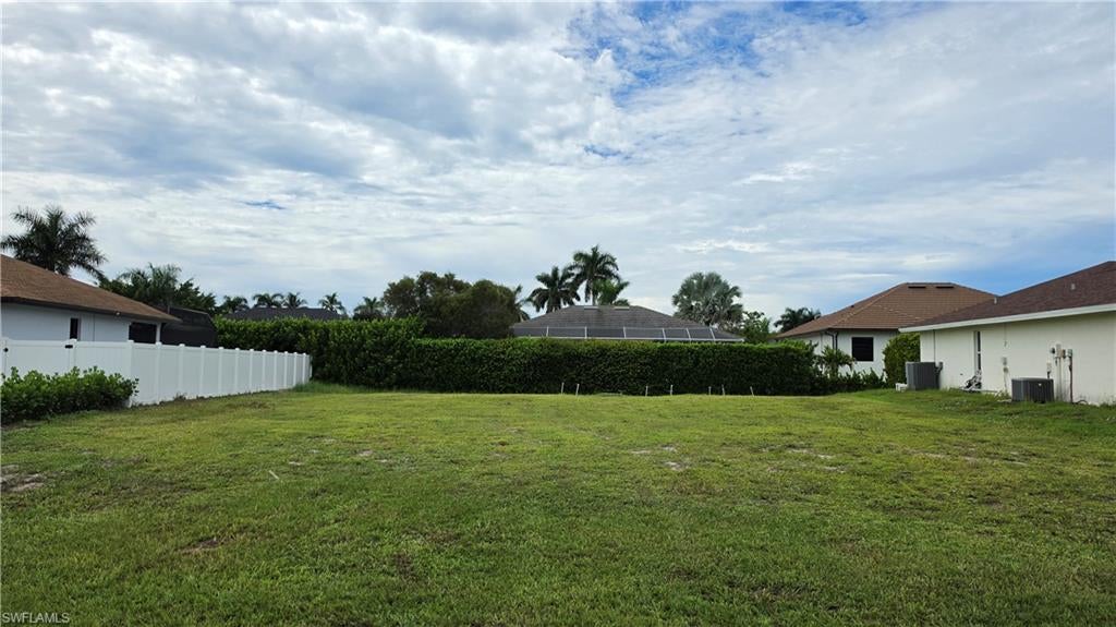 Build Ready Lot with Western Exposure! This centrally located, vacant lot provides an excellent opportunity to build your dream home with approximate dimensions of 73’ (front) x 110’ x 87’ (back) x 110’. It is ideally situated in close proximity to local amenities, shopping, dining, and the stunning beaches of Marco Island. Don't miss this chance to own a piece of paradise in a desirable community.