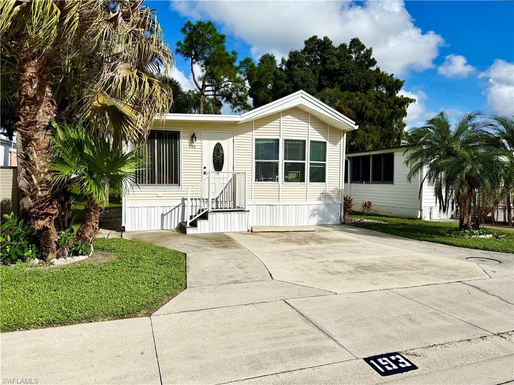 Convenient location, cozy, & cute! This 1Br/1Ba home has plenty of windows for natural lighting, a charming rear patio with a tranquil green space view, and a large storage room. Thank you for viewing 193 Panther Pass in the Imperial Wilderness Condominium Association of Naples, FL. This particular community was never flooded and is well-known for outstanding maintenance, friendly residents, and a strong sense of community. Of particular interest, this community features LAND that YOU OWN! When you purchase your home, you own BOTH the house and the land; it is not a co-op or land lease. This home is being sold furnished and is extremely close to the office/mailroom. IWCA is brilliantly located. It is approximately 3 miles to shopping and restaurants, 11 miles to the Naples beaches, and 8 miles to the Marco Island beaches. Airport access is also easily attainable— a 45-minute drive (RSW). Maximizing the opportunity to affordably own property in Naples, FL, the HOA fee of $898. per quarter is exceptionally reasonable. That fee covers many of your needs: the advantage of a gated community, water, sewer, lawn care, basic cable, trash, recycling, and community amenities. Community amenities include 2 pools with spas, bocce, pickleball, pétanque, tennis, shuffleboard, billiards, ping pong, a library, clubhouse, 2 dog parks (1 pet, 40lb. max.), and a nature trail. Electric golf carts are allowed in this community and there is an extremely active events calendar.