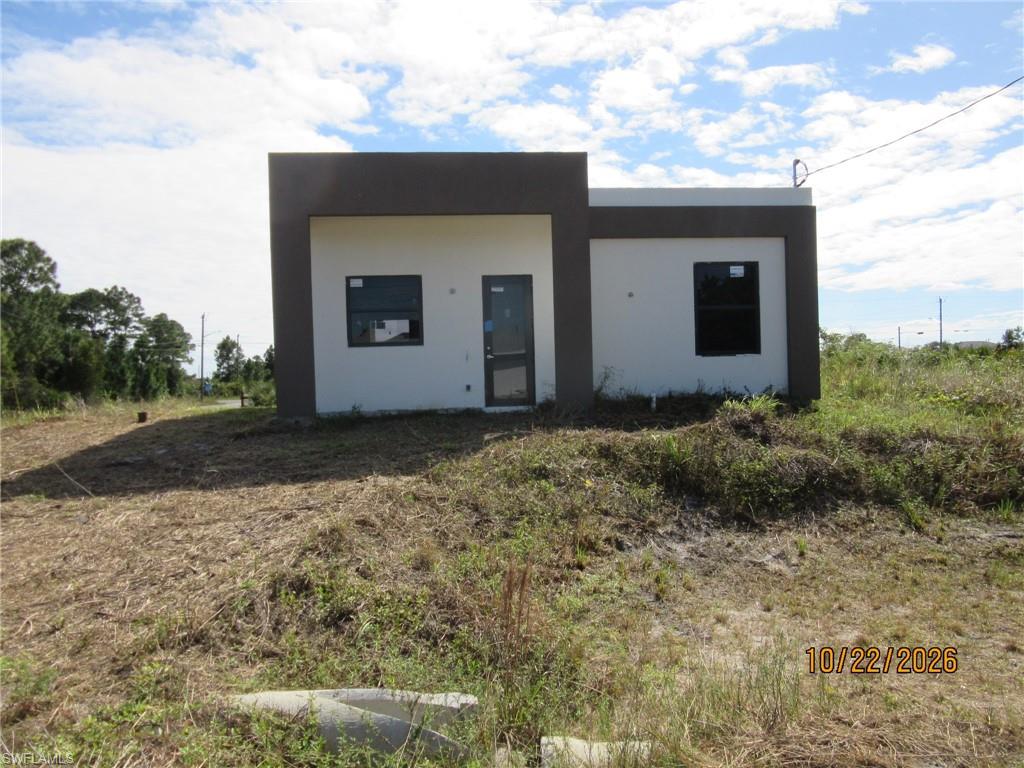 *** INVESTOR ALERT** Outstanding opportunity to own this unfinished new construction home in a desirable Lehigh Acres location! This mostly completed spec home offers the chance for an investor, contractor, or owner-occupant to finish the property to their own tastes and specifications. Situated on a spacious lot, this home has tremendous potential and is ready for the next owner to bring it across the finish line. Whether you're looking for your next investment project or the opportunity to customize your dream home, this property is a must-see. Conveniently located near schools, shopping, dining, and major roadways. Property is being sold AS-IS. Don't miss this unique opportunity!