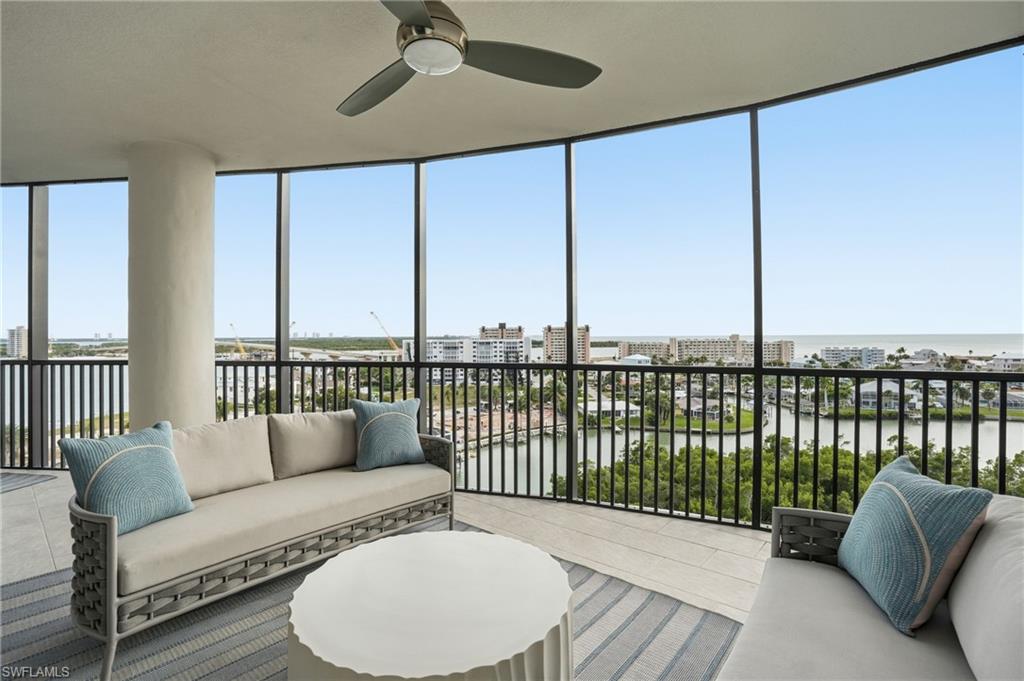 One or more photo(s) has been virtually staged, AI generated or rendered.  Experience refined coastal living at Grandview, the signature final tower within prestigious Waterside by London Bay. Perched on the 9th floor, this exceptional 4-bedroom, 3.5-bath residence offers 2,767 square feet of beautifully appointed living space with sweeping, unobstructed views of the Gulf of Mexico, Estero Bay, and surrounding nature preserves. Professionally designed and furnished by Clive Daniel, the home is offered fully furnished and move-in ready, featuring premium furnishings, linens, dishware, cookware, upgraded hardwood flooring, Bosch appliances, and motorized window shades. A private elevator opens directly into the residence, where floor-to-ceiling windows fill the open-concept interior with natural light and showcase remarkable views from sunrise to sunset. The expansive balcony is ideal for outdoor dining, entertaining, or simply enjoying the coastal setting. Grandview residents enjoy resort-style amenities including a fitness center, yoga studio, pool and spa, indoor and outdoor gathering spaces, cooking areas, fire features, secured parking, enhanced security, and a guest suite available by reservation. Waterside also offers tennis, bocce, pickleball, a putting green, scenic walking paths, and deeded beach access. Ideally located on the south end of Fort Myers Beach near Santini Plaza and Lovers Key State Park, with convenient access to Bonita Beach, Naples, and RSW. **Boat slips may be available for purchase or lease within Waterside.** An exceptional lock-and-leave residence offering panoramic views, sophisticated design, and effortless island living.