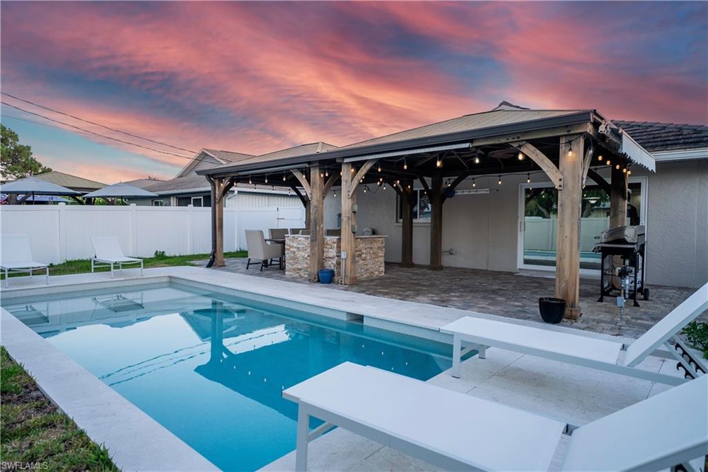 High-Income Producing Opportunity Near Vanderbilt Beach!
Unlock the potential of one of Naples’ most desirable coastal locations. Just one block from Vanderbilt Beach and minutes from Mercato’s luxury shopping, fine dining, and nightlife, this beautifully remodeled 3-bedroom, 2-bath residence is not only a stunning beach retreat but also a proven money-making investment opportunity. With no HOA fees and no rental restrictions, this property is ideally positioned for lucrative seasonal, vacation, or short-term rental income. Surrounded by the excitement of the area and the prestige of the nearby Ritz-Carlton Residences, Naples, this coastal gem offers the perfect blend of lifestyle and profitability. The bright, open floor plan is designed for effortless indoor-outdoor living, while the private backyard oasis creates an unforgettable guest experience. Recent upgrades include hurricane-impact windows and doors, a new A/C unit (2025), tile roof (2018), instant water heater (2020), updated plumbing and electrical systems, new kitchen appliances, plantation shutters, and luxury landscape lighting. The highlight of the outdoor space is the recently added resort-style pool, complemented by a gazebo, outdoor kitchen, and fully fenced yard features that today’s renters actively seek.
Additional conveniences include a tiled 2-car garage with extra storage and lush tropical landscaping that enhances both curb appeal and rental appeal. Whether you're searching for a profitable investment property, vacation rental, seasonal income producer, or your own slice of paradise, this turnkey beach-area home checks every box. Rarely does a property this close to Vanderbilt Beach offer such strong income potential combined with luxury coastal living. Start generating returns while enjoying the best of Naples sunsets, sandy beaches, and endless opportunities just steps from your front door.