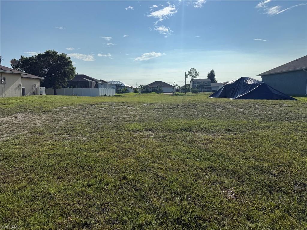 Build your Florida dream home on this *PRIME VACANT LOT* with *EASTERN REAR EXPOSURE* located in the highly desirable and rapidly growing NW quadrant of Cape Coral! Perfectly positioned in a quiet, modern neighborhood, this high-demand building site features *CITY WATER & SEWER UTILITY ASSESSMENTS PAID*. Located in close proximity to Pine Island Rd and the future Seven-Islands project.
