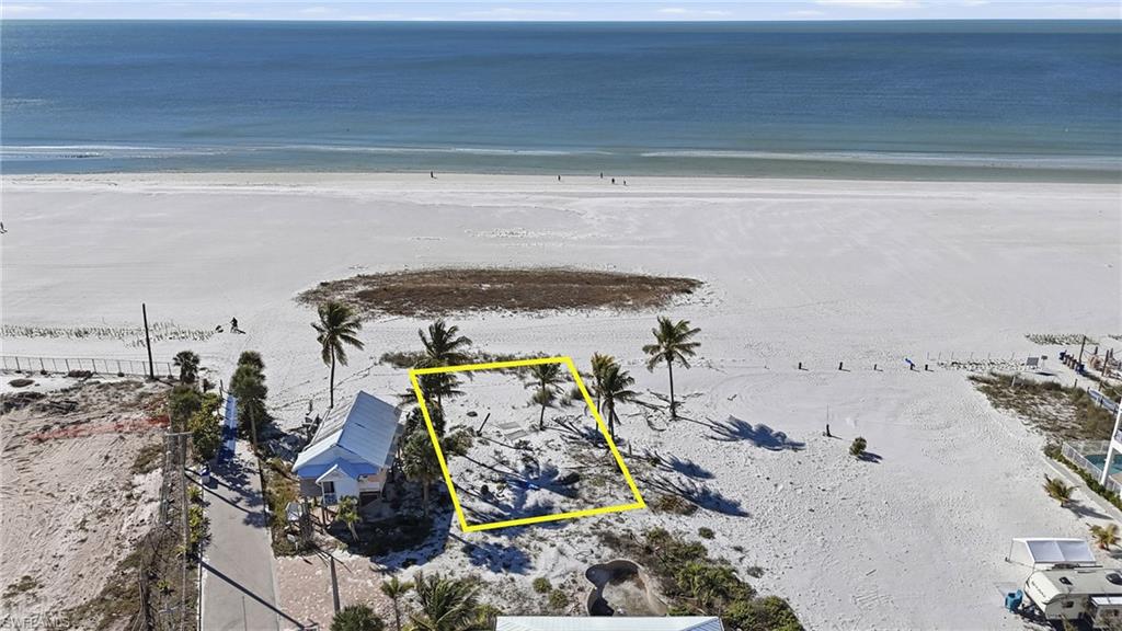 Prime Mixed-Use Opportunity in Downtown District – Endless Development Potential
Build Your Dream on the Gulf – Rare Fort Myers Beach Waterfront Opportunity  – Welcome to one of the most coveted offerings on Fort Myers Beach—a stunning direct Gulf-front lot where endless sunsets, sugar-white sand, and panoramic water views set the stage for your ultimate coastal retreat. This is a rare chance to design and build a custom luxury residence in one of Southwest Florida’s most desirable beachfront locations.
Wake up to the sound of waves, step directly onto the beach from your own backyard, and enjoy unobstructed views of the Gulf of Mexico from sunrise to sunset. Whether you envision a modern beachfront masterpiece or a classic coastal estate, this prime homesite offers the perfect canvas for a truly exceptional property.
Located just minutes from world-class dining, shopping, marinas, and the vibrant Times Square district, this lot combines privacy, prestige, and prime location—making it ideal for both a personal dream home or a high-end investment. Opportunities like this are exceedingly rare. Now is the time to turn this Gulf-front dream into reality.