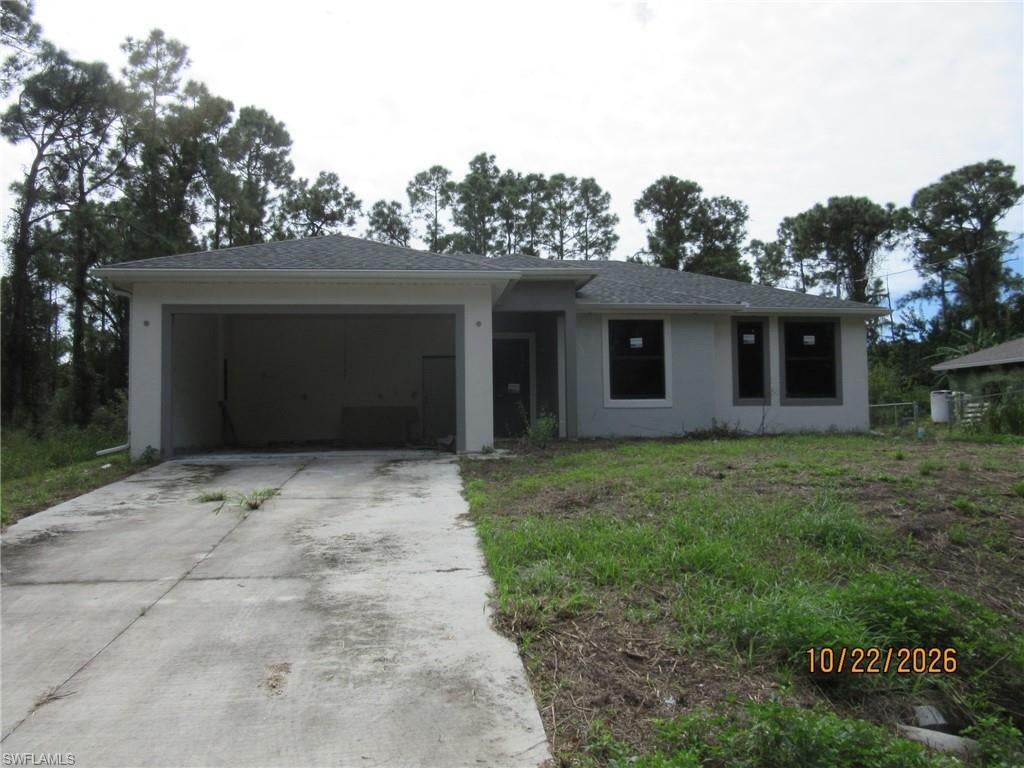 *** INVESTOR ALERT** Outstanding opportunity to own this unfinished new construction home in a desirable Lehigh Acres location! This mostly completed spec home offers the chance for an investor, contractor, or owner-occupant to finish the property to their own tastes and specifications. Situated on a spacious lot, this home has tremendous potential and is ready for the next owner to bring it across the finish line. Whether you're looking for your next investment project or the opportunity to customize your dream home, this property is a must-see. Conveniently located near schools, shopping, dining, and major roadways. Property is being sold AS-IS. Don't miss this unique opportunity!