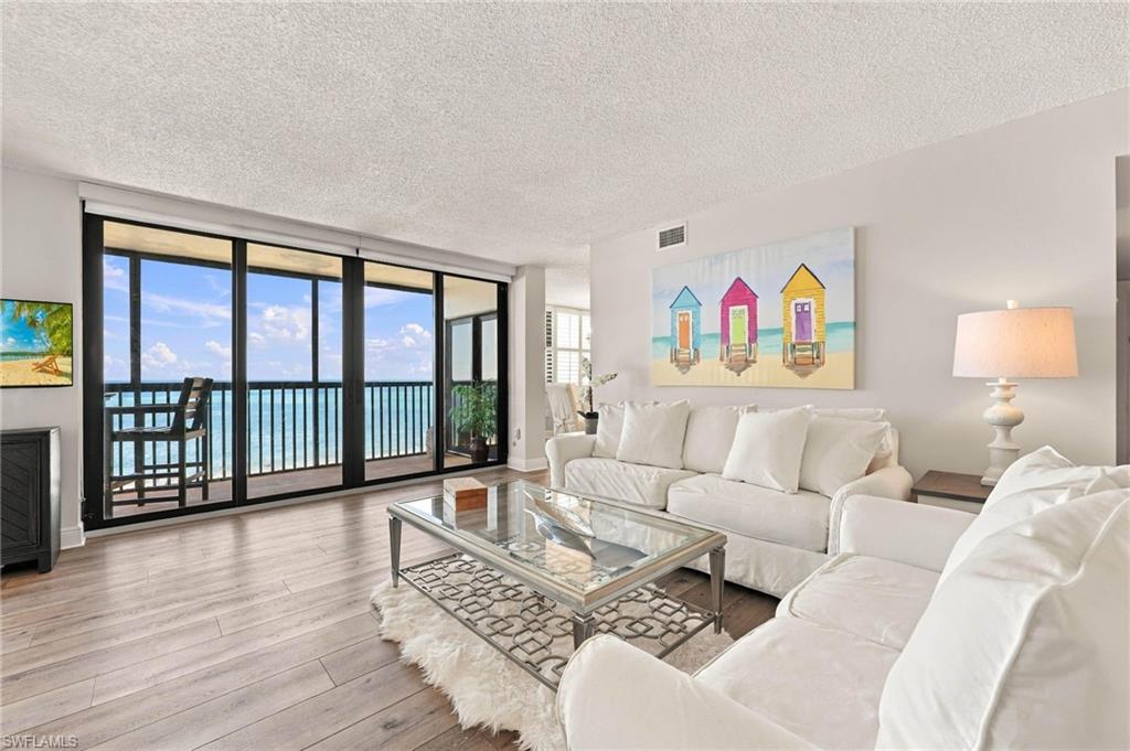 Welcome to your dream beachfront getaway! This gorgeous, turnkey furnished 2-
bedroom, 2-bathroom end-unit condo at Seawatch on Vanderbilt Beach is now available for lease. Beautifully designed with a bright, coastal vibe, this meticulously maintained home offers the perfect blend of luxury and comfort. Inside, you’ll find high-end features throughout, including beautiful wood flooring, plantation shutters, high baseboards, privacy UV shades, and impact-resistant hurricane sliders that frame direct beach views. The open-concept living area flows seamlessly onto a spacious screened lanai and balcony—the perfect spot to watch the waves roll in over the Gulf. The primary suite is a private retreat of its own, complete with a king-size bed, a massive walk-in closet, its own private balcony, and stunning eastern views of the bay to watch the sunrise. Your guests will feel right at home in the second bedroom, which offers a full & a twin bed and is an en-suite bathroom with a tub/shower combination. The fully equipped kitchen features a deep sink and overlooks the dining area, keeping you connected to the water views while cooking. For added convenience, the unit also includes a high-end, in-unit washer and dryer. As a resident at Seawatch, you'll enjoy fantastic community amenities, including secure elevator access, private beach entry, a large heated pool, dedicated beach storage, a BBQ grilling area, and a spacious community room with a kitchen and TV. Best of all, you're just minutes away from world-class dining, shopping, entertainment, and the beautiful Delnor-Wiggins Pass State Park. AVAILABLE OCTOBER , NOVEMBER & DECEMBER 2026 - DISCOUNTED RATE - $9,750/MONTHLY. 30 DAY MINIMUM.