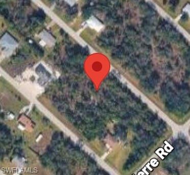 Looking for the perfect place to build or invest? This vacant parcel is full of potential! Whether you're planning your own Southwest Florida retreat, building an income-producing rental property, or creating the ultimate garage or man-cave, this property offers exciting possibilities. Buildable plans are already available and ready to go, making this an excellent opportunity for investors looking to build attractive rental properties!