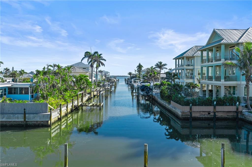 STUNNING CORNER WATERFRONT CONDO WITH GULF & BAY VIEWS, PRIVATE BOAT SLIP, AND WEEKLY RENTAL FLEXIBILITY!
Welcome to your ultimate coastal retreat on beautiful Fort Myers Beach! This fully remodeled and beautifully furnished 2-bedroom, 2-bathroom corner condo offers the perfect combination of modern coastal luxury, breathtaking water views, boating convenience, and exceptional investment potential.
Step inside to discover a bright and spacious OPEN FLOOR PLAN featuring stylish modern finishes, high-end appliances, and tasteful furnishings throughout. The open-concept kitchen flows seamlessly into the living and dining areas, creating an inviting space for relaxing and entertaining. As a desirable CORNER UNIT, additional windows fill the residence with natural light while showcasing stunning BAY and GULF VIEWS from multiple angles.
Enjoy spectacular sunsets and refreshing coastal breezes from your PRIVATE BALCONY, the perfect place to unwind and take in the beautiful waterfront surroundings.

BOATING ENTHUSIASTS WILL LOVE THE INCLUDED PRIVATE BOAT SLIP, providing convenient access to the bay and Gulf waters. Whether you're heading out for a day of fishing, boating, or exploring Southwest Florida's waterways, your boat is just steps away!

DIRECT BEACH ACCESS is conveniently located just across the street, allowing you to enjoy the sugar-white sandy beaches and turquoise waters of Fort Myers Beach within moments of leaving your condo.

WEEKLY RENTALS ARE ALLOWED, offering outstanding flexibility for owners who want to enjoy their waterfront getaway while generating potential short-term rental income. The combination of waterfront views, an included boat slip, beach access, and a beautifully updated interior makes this property especially attractive to vacationers.

Ideally located near waterfront restaurants, shopping, entertainment, and everything Fort Myers Beach has to offer, this MOVE-IN-READY CONDO delivers the ultimate island lifestyle.

Whether you're searching for a personal vacation retreat, a waterfront second home, or an income-producing investment property, this exceptional corner condo offers it all!

DON'T MISS THIS RARE OPPORTUNITY TO OWN A FULLY RENOVATED WATERFRONT CONDO WITH A PRIVATE BOAT SLIP, GULF & BAY VIEWS, AND WEEKLY RENTAL FLEXIBILITY ON FORT MYERS BEACH!