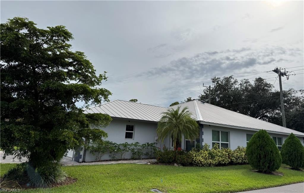Like-new attached villa in the heart of LaBelle. Formerly a mode home, then used as a second home by both owners, this property has been lightly used and meticulously maintained. Brand new (September 2026) tile floors in the common areas, impact resistant windows and doors, gas stove, high ceilings, and stainless steel appliances. This is the only unit with a patio, perfect for relaxing in the evening. Conveniently located minutes from shopping, restaurants, several gyms, and Downtown LaBelle. Approximately 45 minutes from Fort Myers, this is an ideal opportunity to own a home in one of the fastest growing areas in Florida.