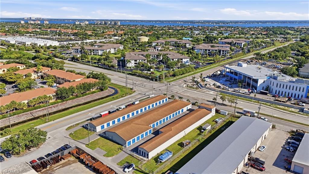 Rare opportunity to acquire Storage Quarters, a stabilized, highly automated 176-unit self-storage facility on an irreplaceable signalized hard corner at Gladiolus Drive (SR 865) and Pine Ridge Road in fast-growing south Fort Myers. Three single-story, drive-up, concrete-block buildings (approx. 19,720 SF) sit on 1.24 acres, complemented by outdoor RV/vehicle parking and mailbox rentals. Customers pull directly to their unit, with no elevators or long interior hallways, a convenience that resonates with the area's boaters, contractors, retirees, and seasonal residents.

Location is the headline. Gladiolus Drive is a six-lane arterial carrying roughly 21,300 vehicles per day at the frontage and about 44,600 per day, delivering exceptional visibility and signage exposure. Lee County is among the nation's fastest-growing markets, up roughly 15% since 2020 to about 876,000 residents and projected near 1,000,000 by 2045, an expanding and mobile customer base that fuels storage demand. Southwest Florida's boating and RV lifestyle and a seasonal "snowbird" influx create steady, recurring demand for drive-up and vehicle/RV storage.

The business runs almost entirely online through the Cubby AI platform: tenants reserve, lease, pay, and manage autopay from any device, while machine-learning revenue management moves customers in at promotional rates and steps them up automatically. The result is in-place rents that exceed street rates and about 109% economic occupancy. A part-time on-site manager is compensated with an apartment, so there is NO cash management salary, keeping the operation lean and largely absentee-friendly. Required SafeLease tenant protection adds recurring ancillary income.

Upside is built in. Standard storage units run about 84% occupied, with lease-up runway concentrated in small lockers and RV parking. Continued AI-driven rate increases and a vertical (stilt) expansion concept, adding a 2nd/3rd story and climate-controlled product the local market offers but Storage Quarters does not, provide multiple paths to grow NOI. Split CG/IL zoning supports storage and expansion. The corner lies in Flood Zone AE yet took no flooding during Hurricanes Ian, Milton, or Helene.

Pride of ownership shows: about $80,000 of recent capital improvements, including new roofs (2018), exterior paint (2024), asphalt sealcoat (2025), and a new high-efficiency A/C (2026), mean low deferred maintenance for a new owner. Offered at $2,616,250, a 6.0% in-place cap with pro forma yields growing toward roughly 7%, a rare turnkey, cash-flowing asset with a clear growth runway on one of Fort Myers' best corners.

Complete financials, rent roll, occupancy reports, leases, survey, site plan, insurance, and capital records are available in the secure data room. A confidentiality/non-disclosure agreement is required: click the link to review and sign the agreement and gain immediate access. https://docsend.com/view/s/cfgvcfs32qa3ggkv