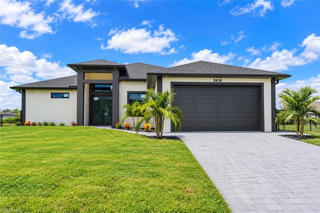 STUNNING CORNER-LOT HOME LOADED WITH LUXURY UPGRADES! This exceptional property offers 3 spacious bedrooms, 3 beautifully designed bathrooms, plus a versatile den/office. Enjoy high-end finishes throughout, including elegant accent walls, custom ceiling designs, upgraded bathrooms, and fully customized closets. The modern kitchen and open living spaces create the perfect atmosphere for everyday comfort and entertaining. Step outside to a spectacular lanai featuring a summer kitchen, beautifully landscaped yard, and fully fenced corner lot offering privacy and plenty of space for gatherings. One bathroom provides convenient outdoor access, perfect for entertaining! Additional features include impact-resistant windows and doors, a paved driveway, washer and dryer, and a garage with epoxy flooring. Conveniently located near US-41, offering easy access to shopping, dining, and major roads. A PERFECT COMBINATION OF LUXURY, STYLE, AND FUNCTIONALITY! SCHEDULE YOUR PRIVATE SHOWING TODAY!